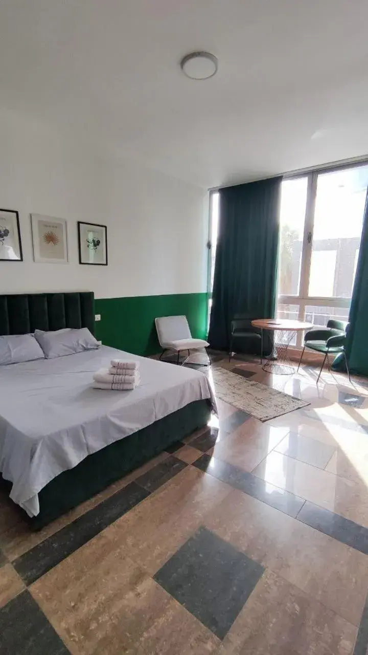 Bed in Cactus Apartments Bed in Cactus Apartments