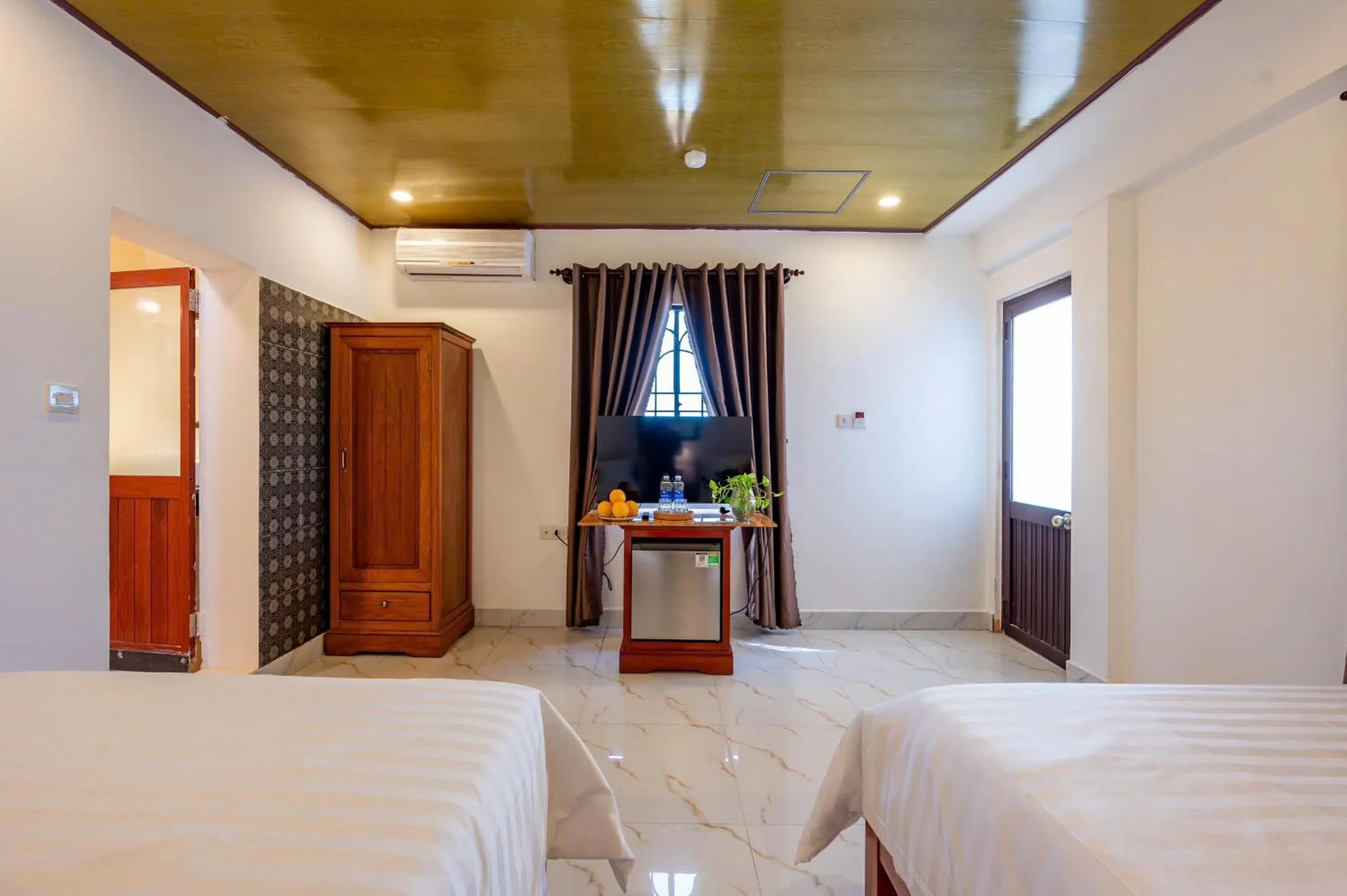 Bed in Golden Sun Hotel Hoi An
