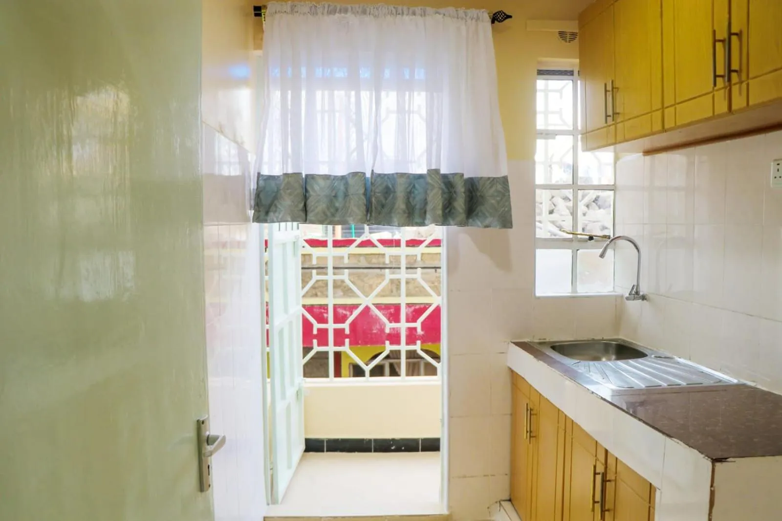 Kitchen or kitchenette in Dayo Suites and Hotel