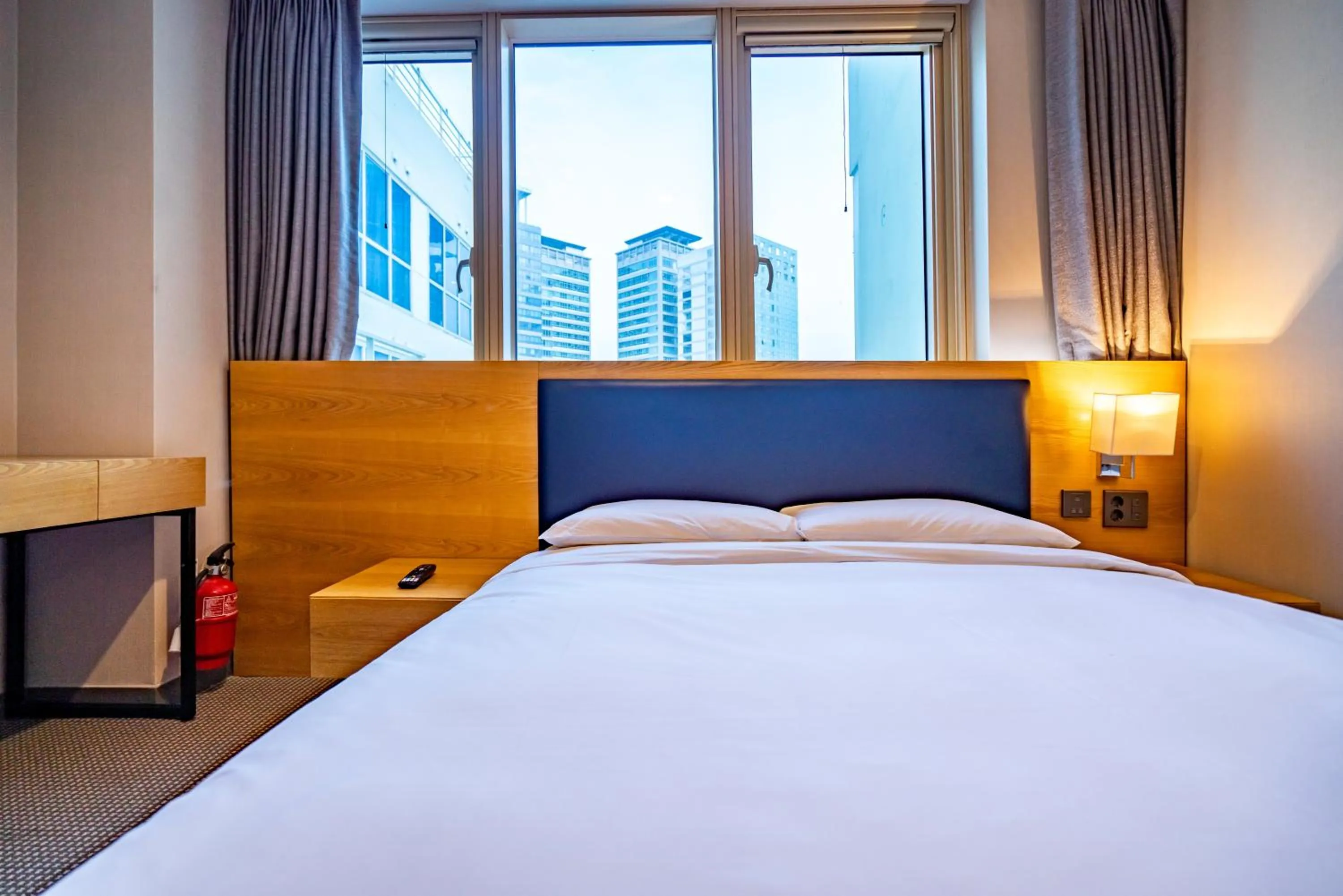 Bed in Centum Business Hotel