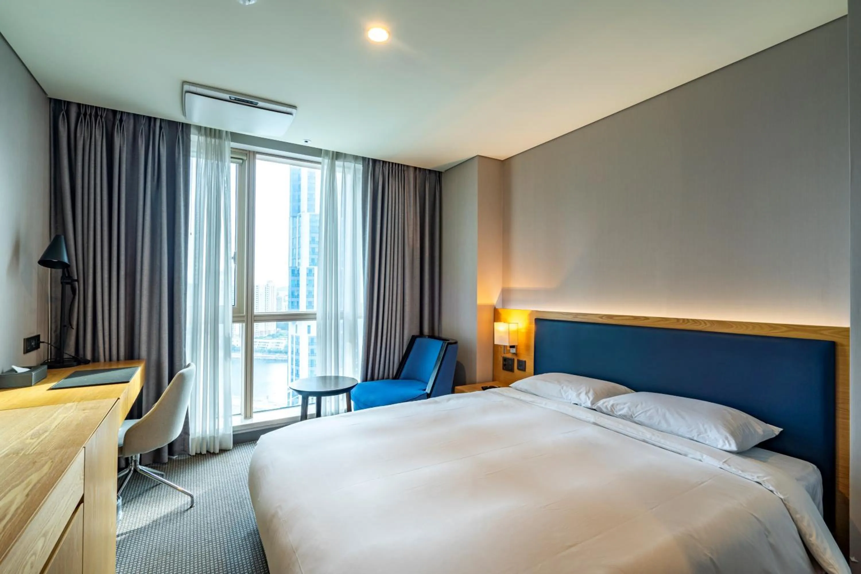 Bed in Centum Business Hotel