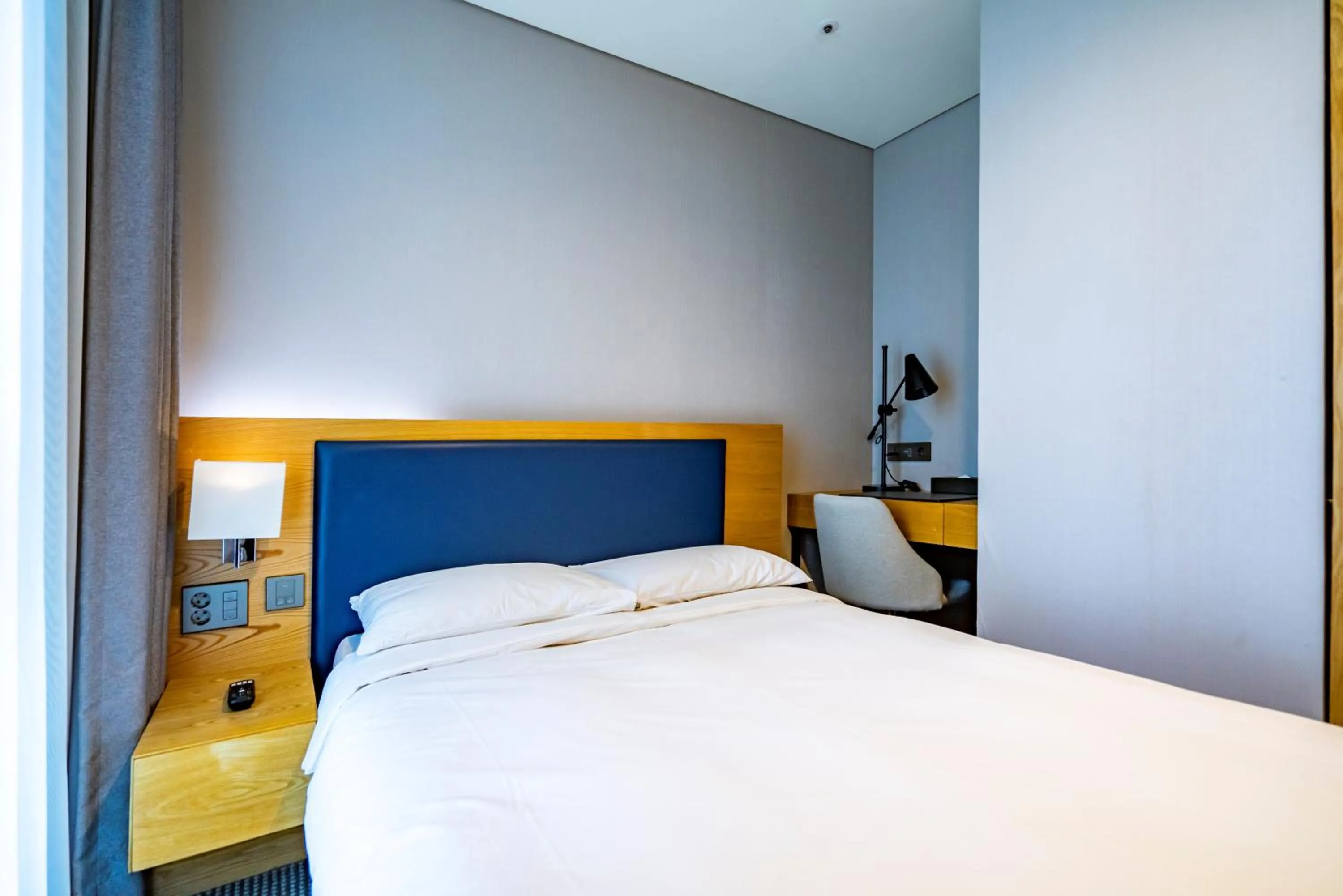 Bed in Centum Business Hotel