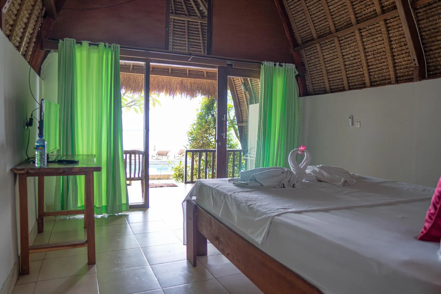 Bed in Krisna Bungalows and Restaurant