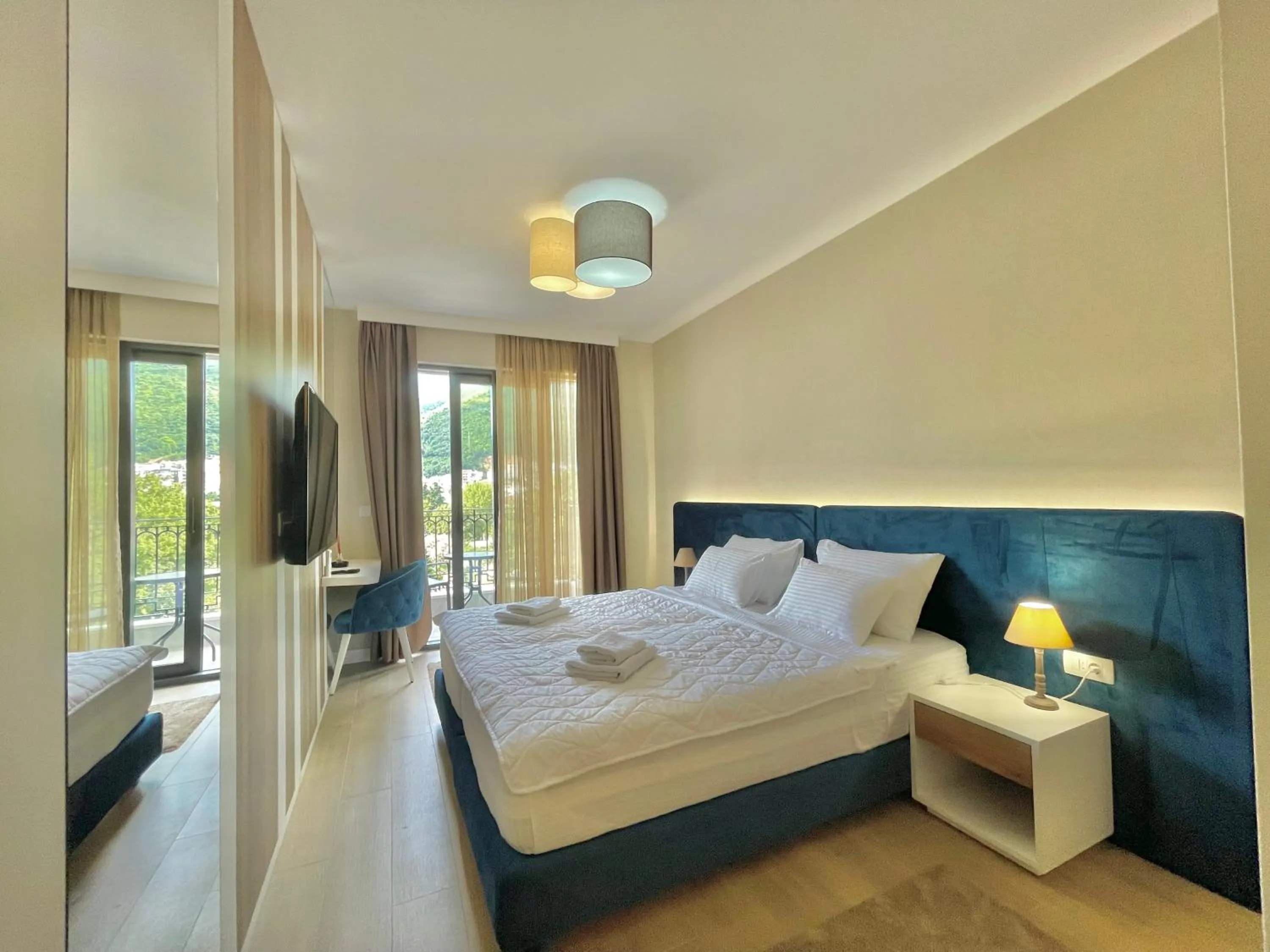 Bed in Comfort Apartments Pasha