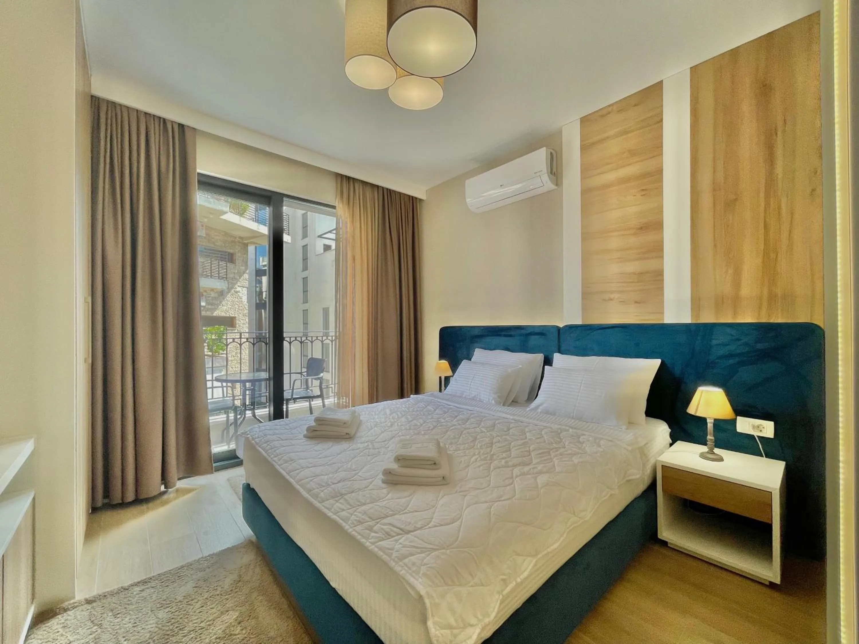 Bed in Comfort Apartments Pasha