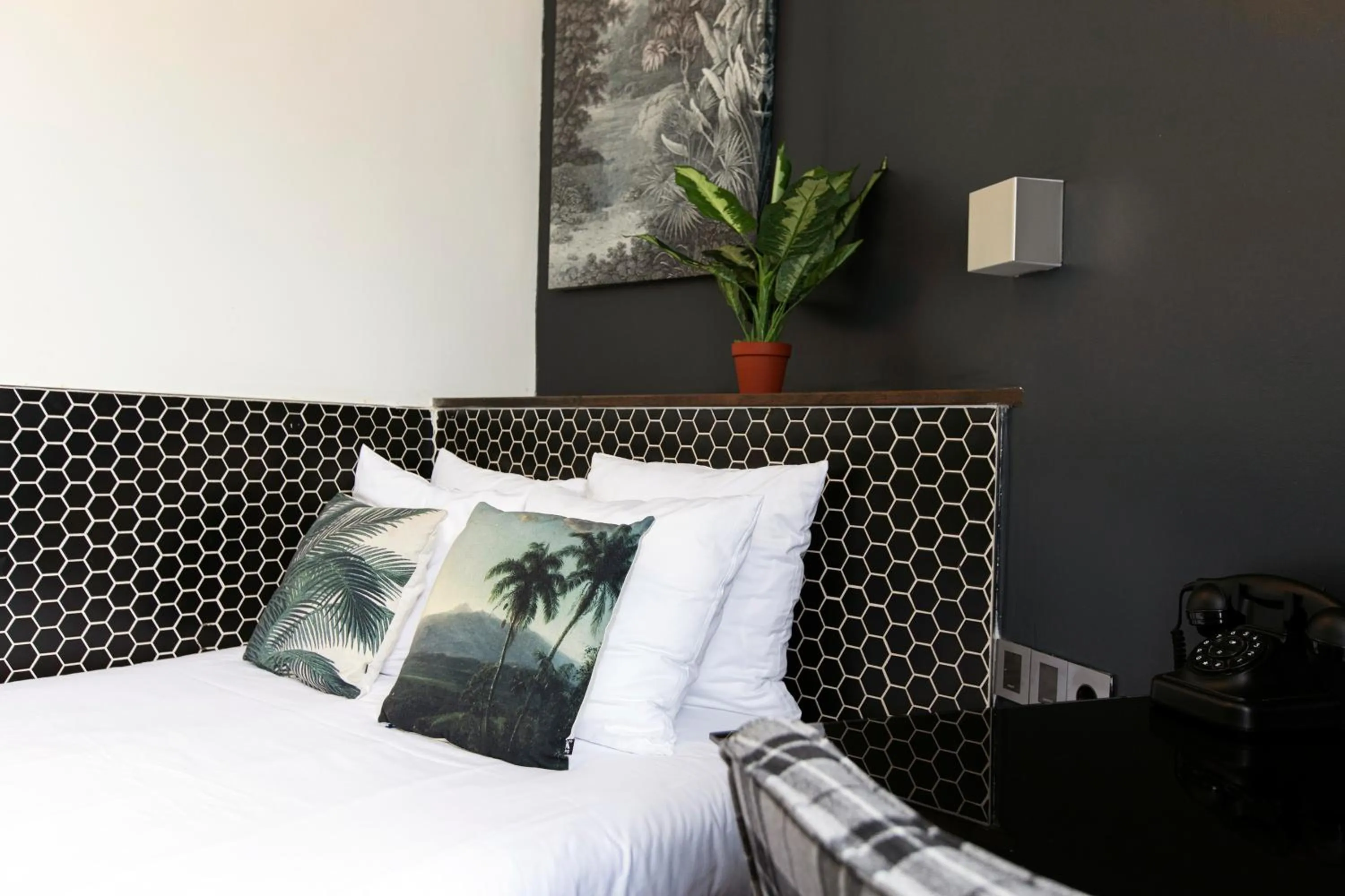 Bed in Quentin Amsterdam Hotel