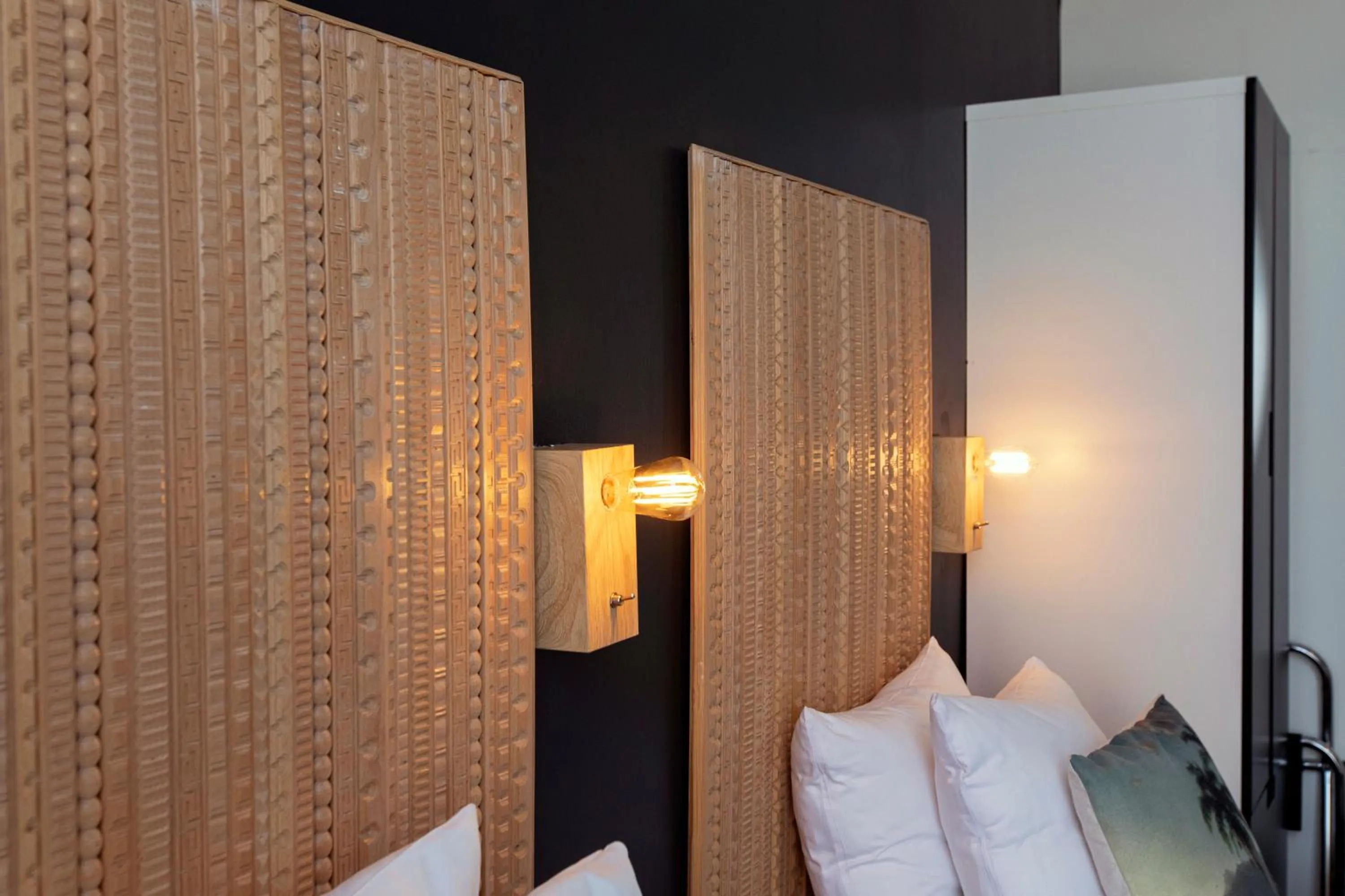 Decorative detail, Bed in Quentin Amsterdam Hotel