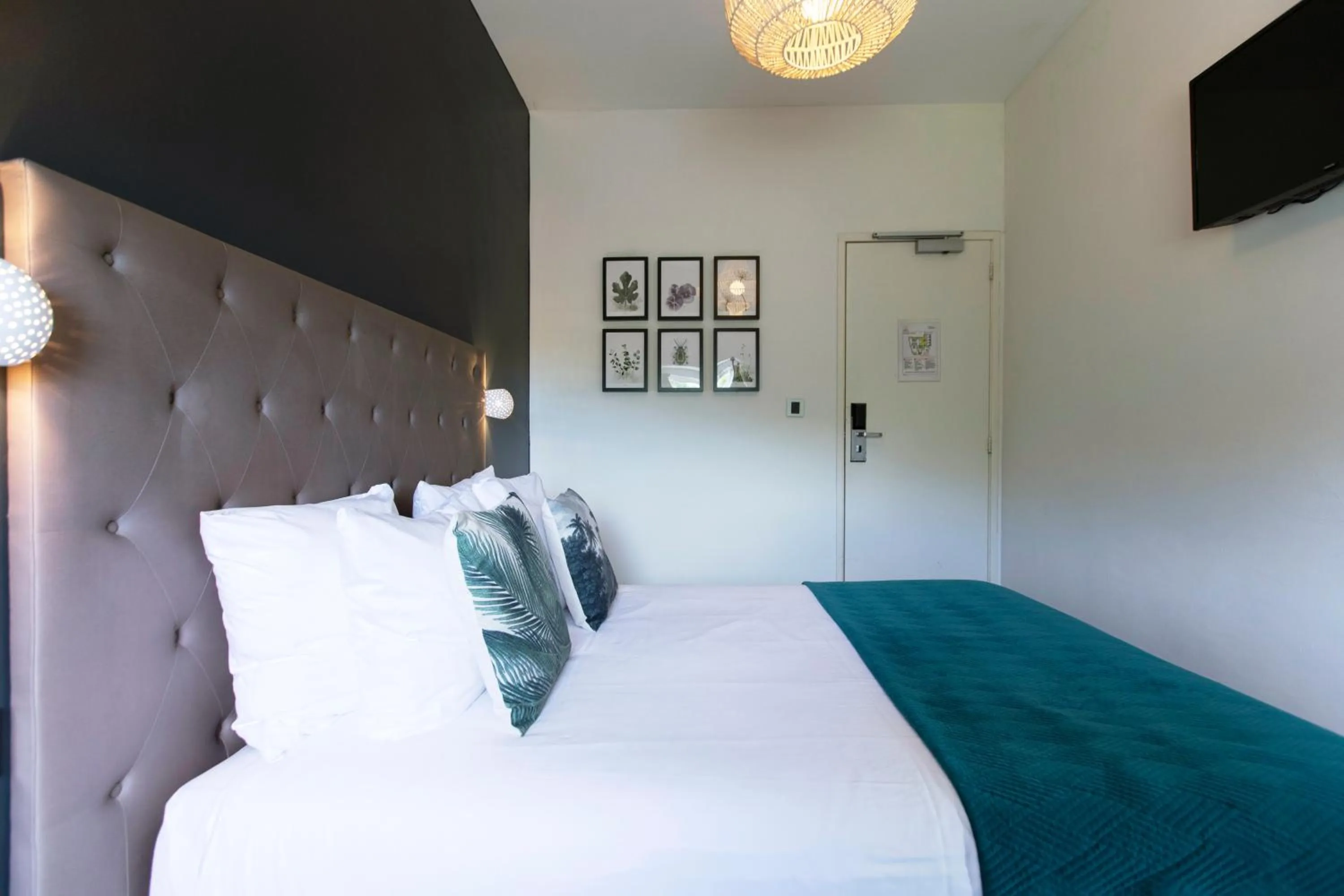 Bed in Quentin Amsterdam Hotel