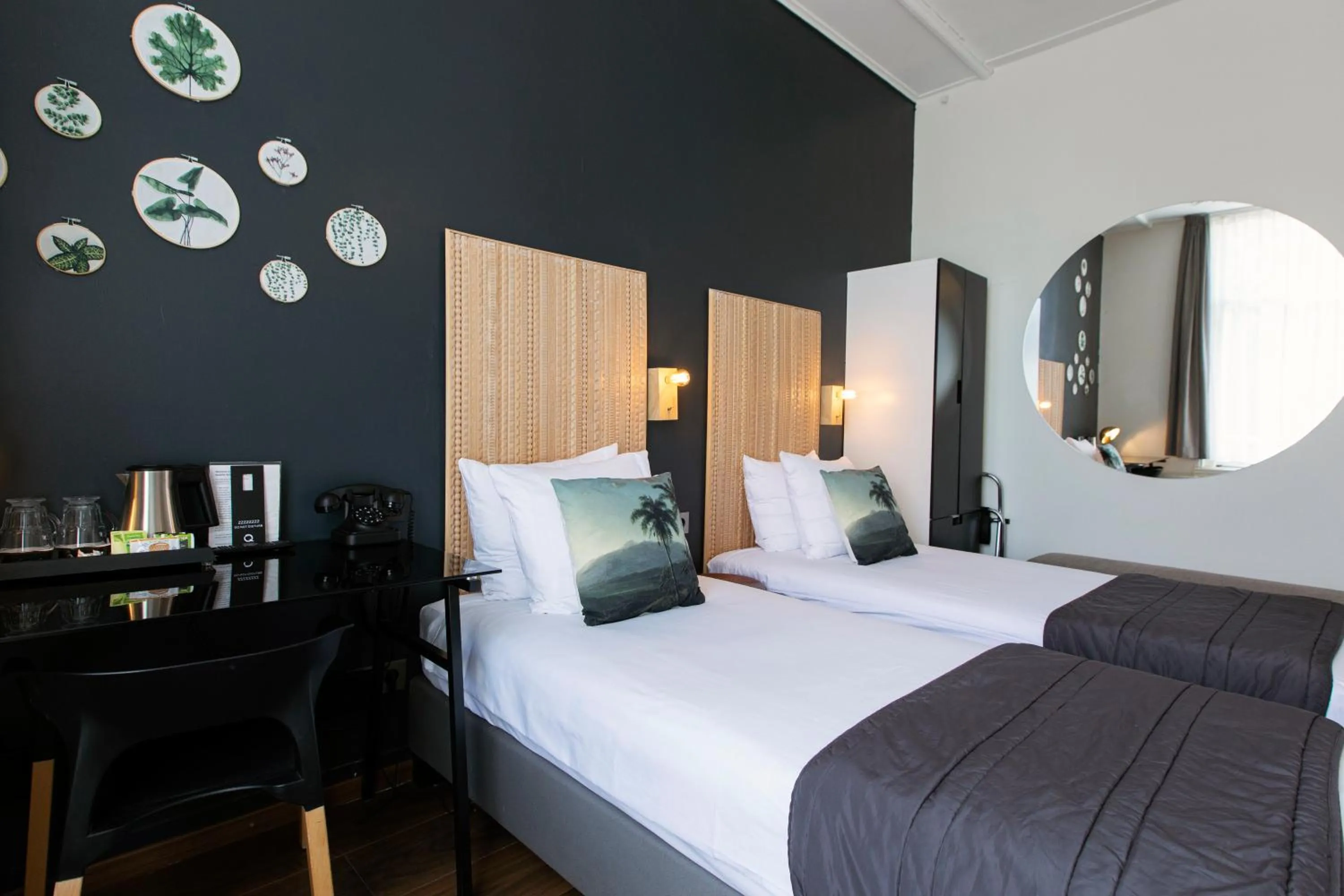 Bed in Quentin Amsterdam Hotel