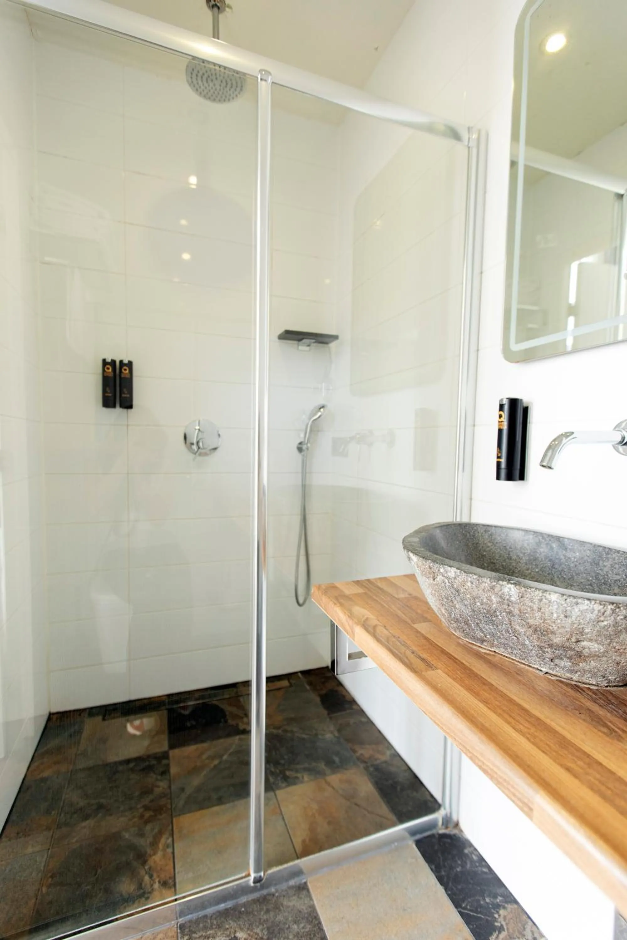 Shower in Quentin Amsterdam Hotel