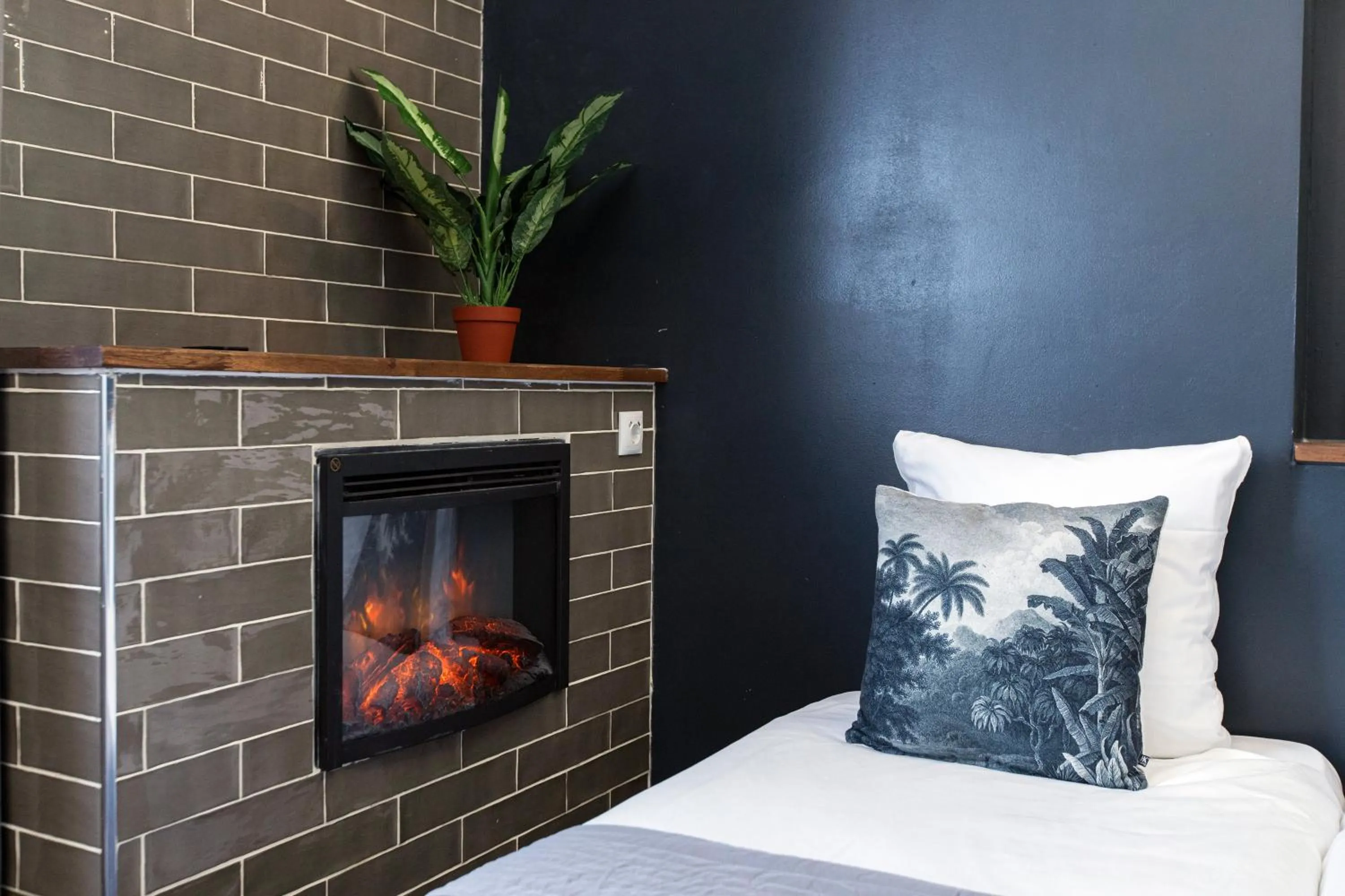 Bed in Quentin Amsterdam Hotel