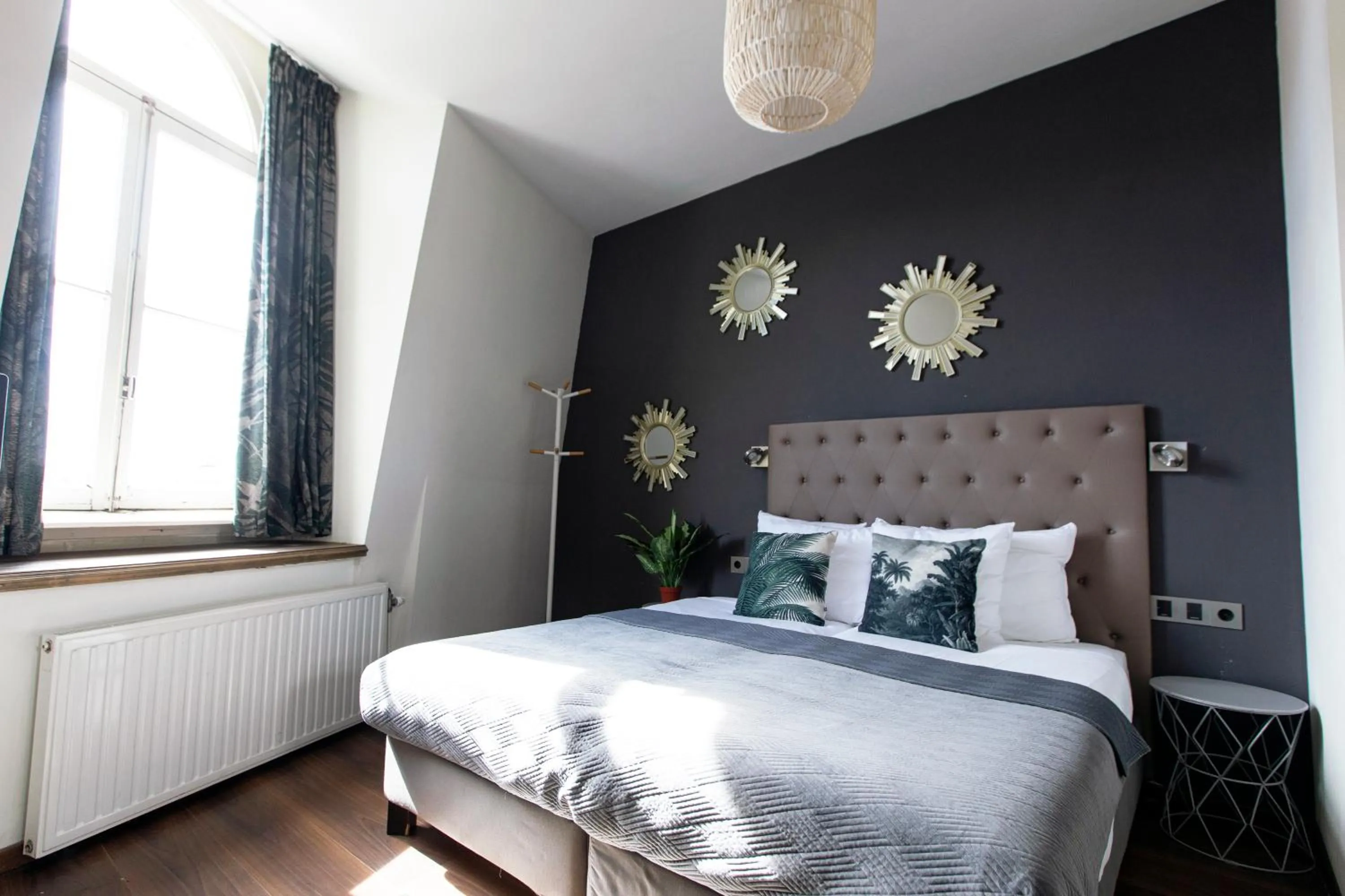 Bed in Quentin Amsterdam Hotel