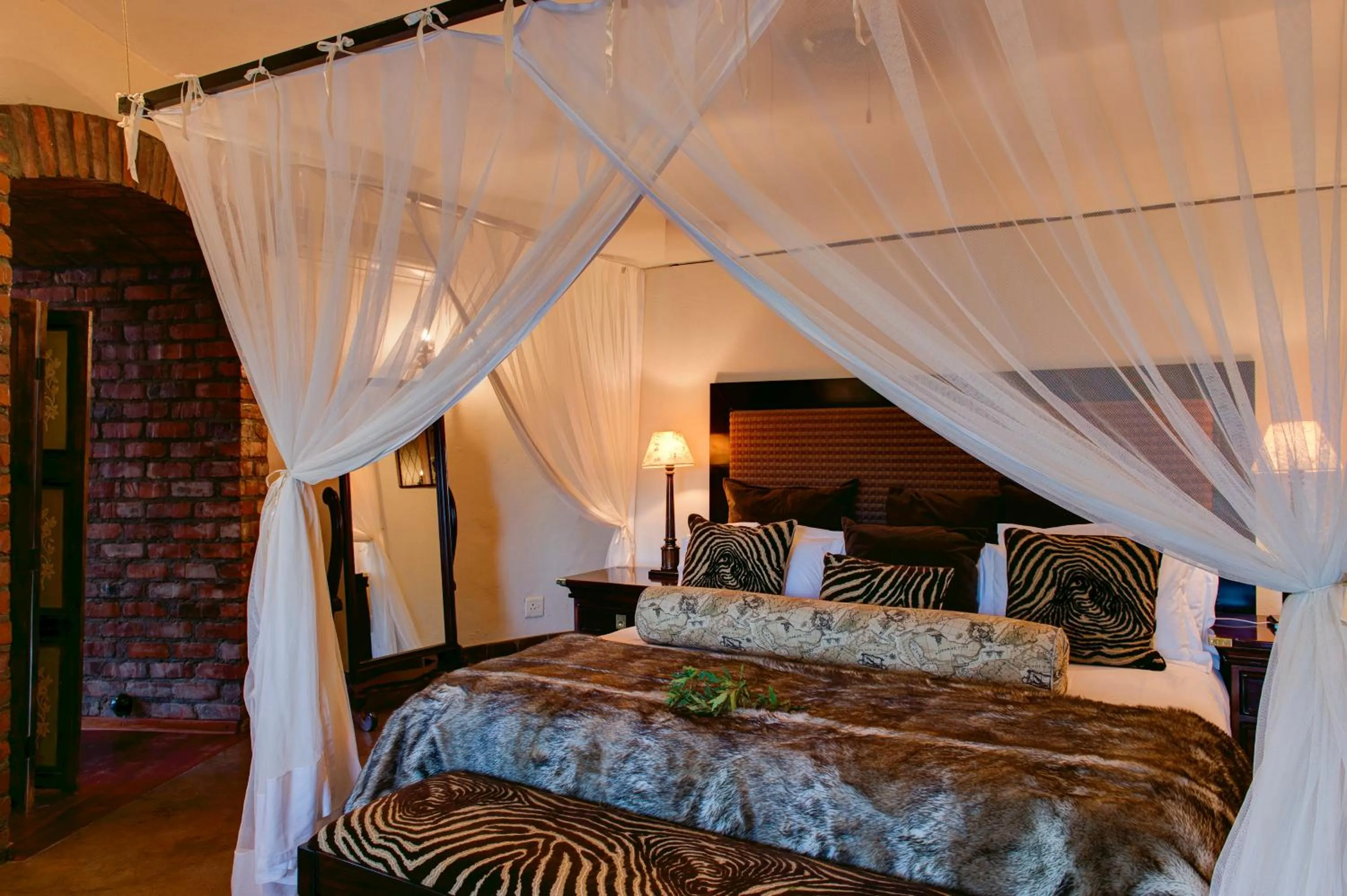 Bed in Tintswalo Safari