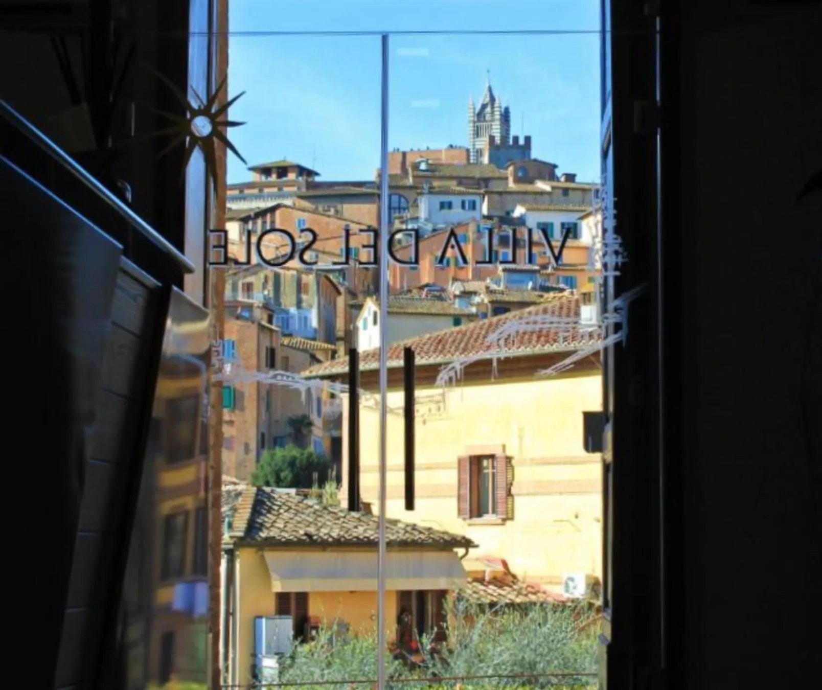 Property logo or sign in Villa del Sole Siena