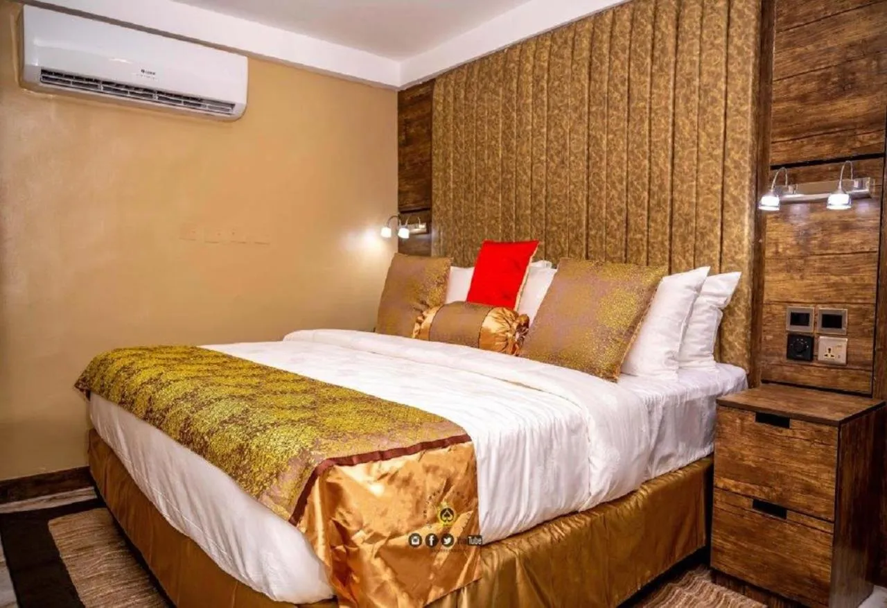 Bed in Joker Hotel and Suites