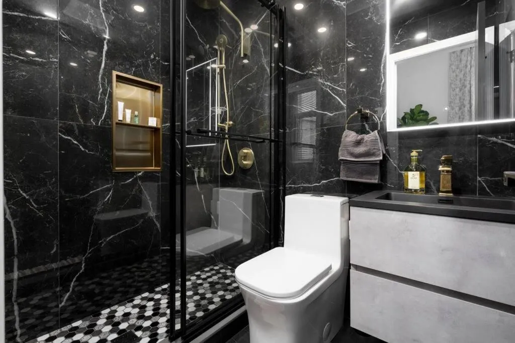 Shower in Downtown Luxe: Metro, King Bed, Parking, Sleeps 6