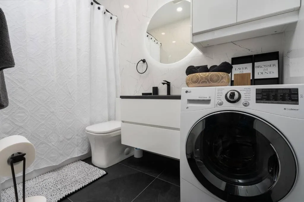 Bathroom in Downtown Luxe: Metro, King Bed, Parking, Sleeps 6