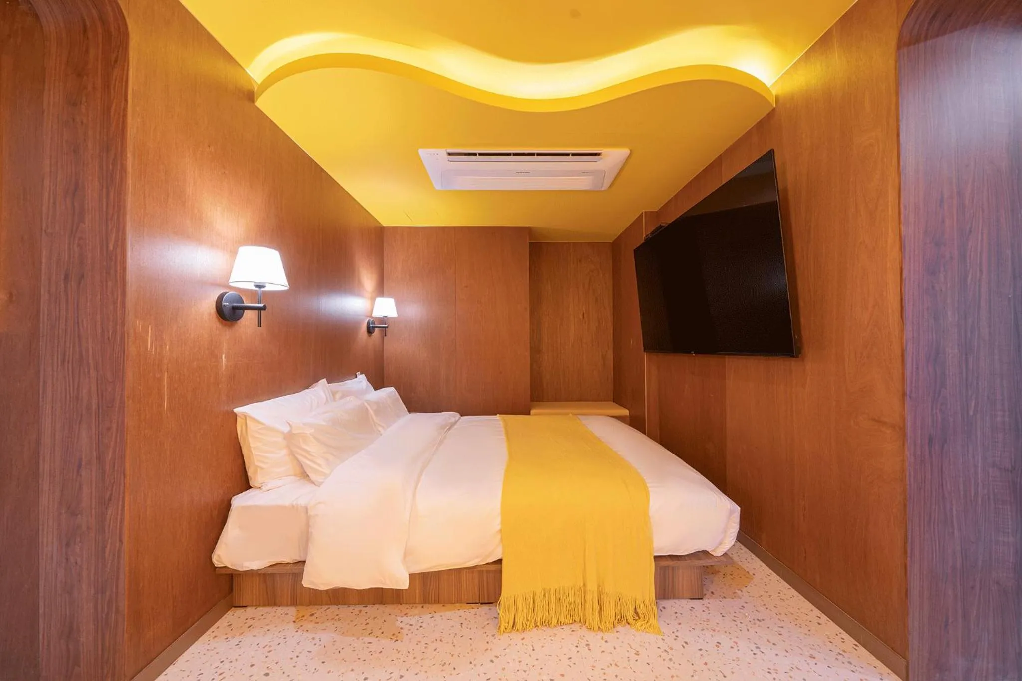 Bed in Nouvelle Hotel Seoul Itaewon by Aank