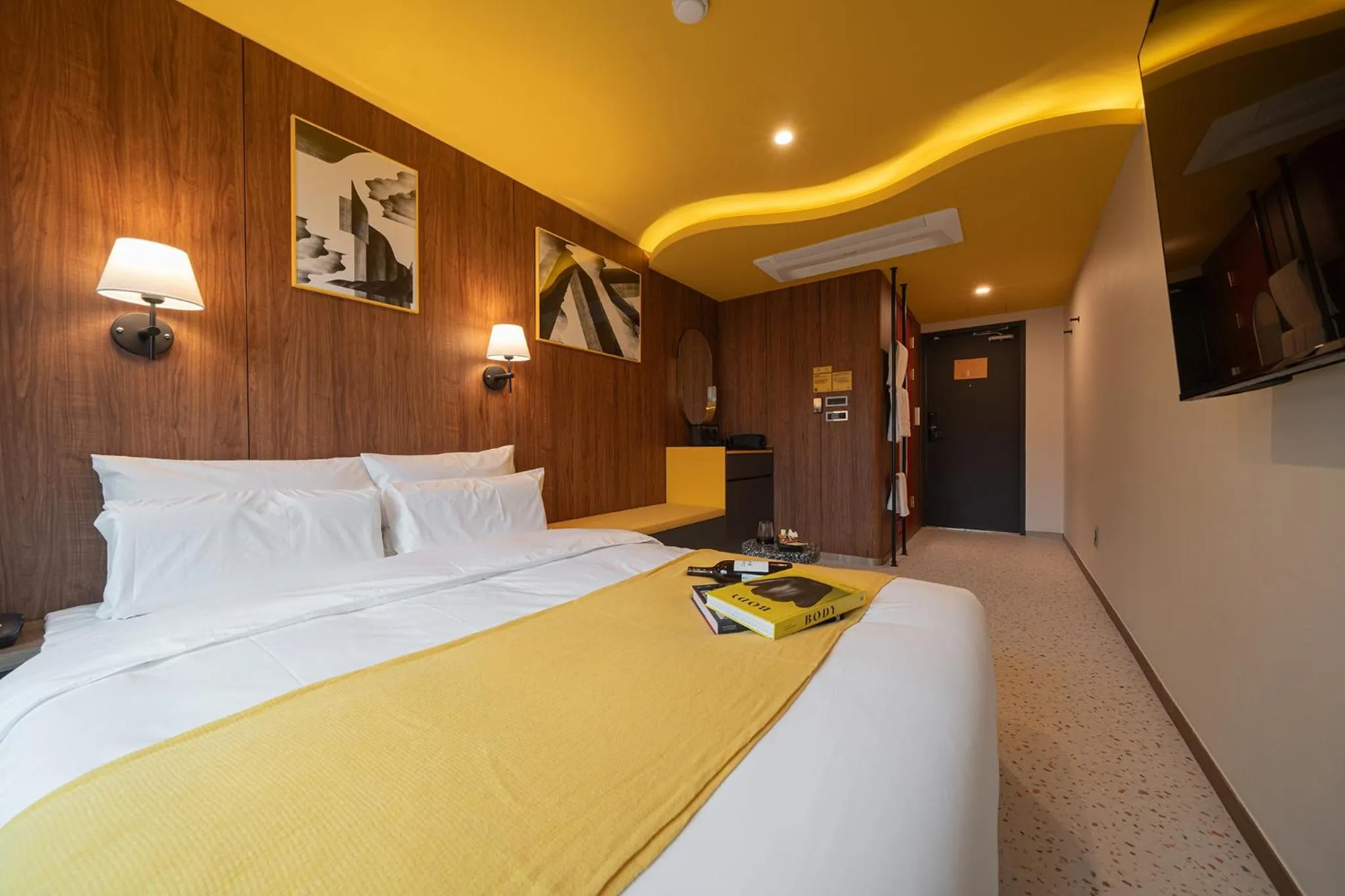 Bed in Nouvelle Hotel Seoul Itaewon by Aank