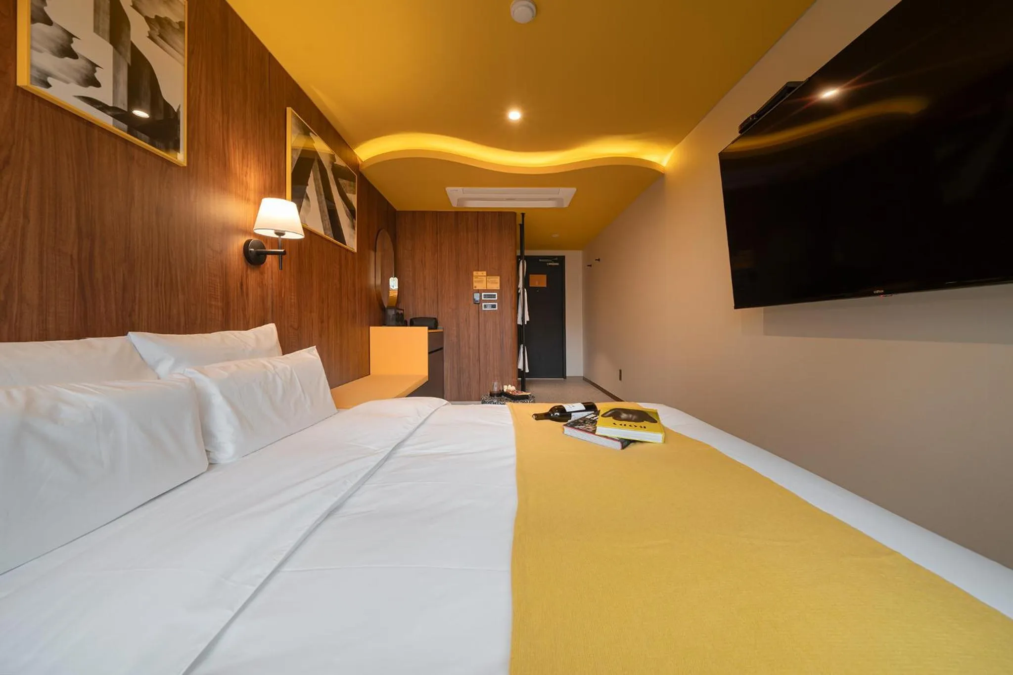 Bed in Nouvelle Hotel Seoul Itaewon by Aank