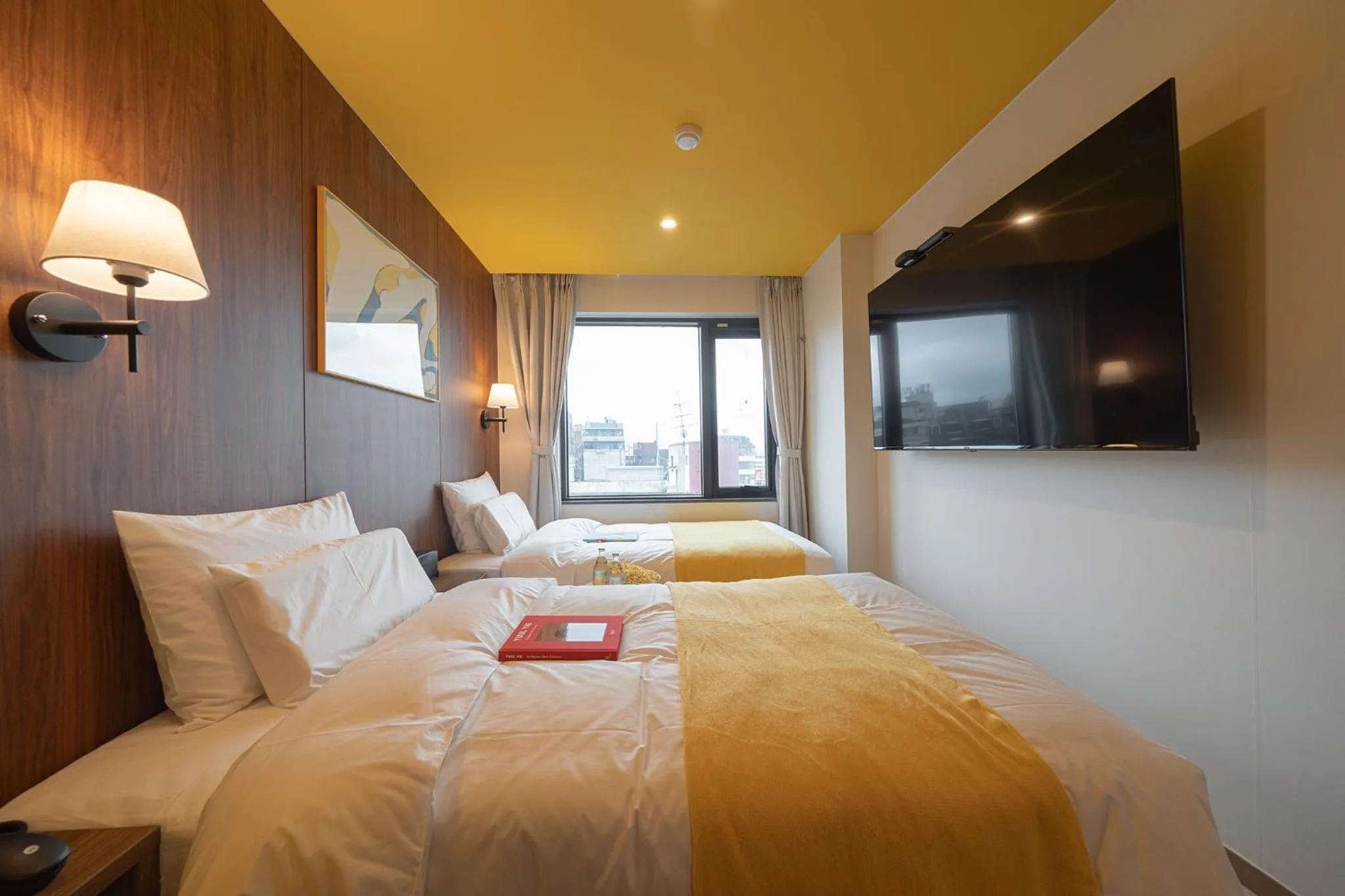 Bed in Nouvelle Hotel Seoul Itaewon by Aank