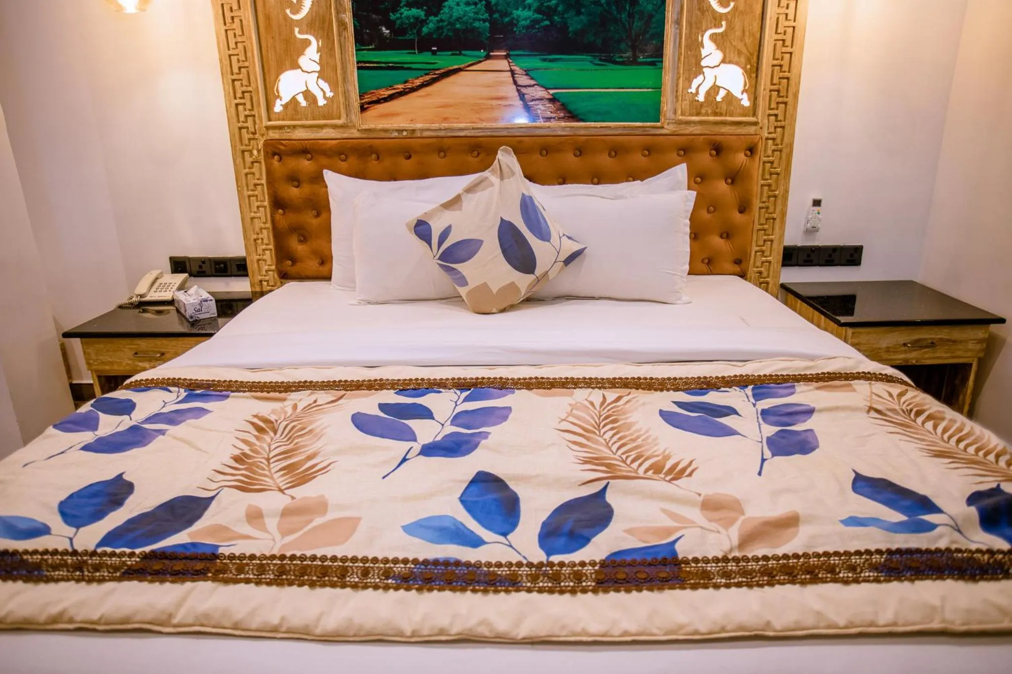 Bed in Emerald Bay Resort Mirissa