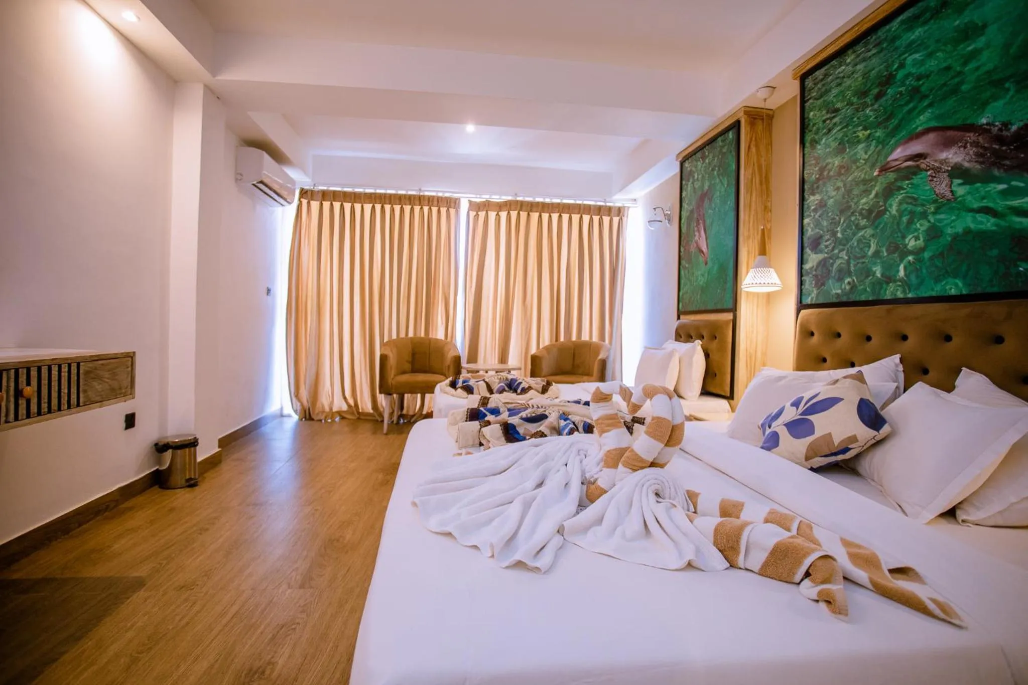 Bed in Emerald Bay Resort Mirissa