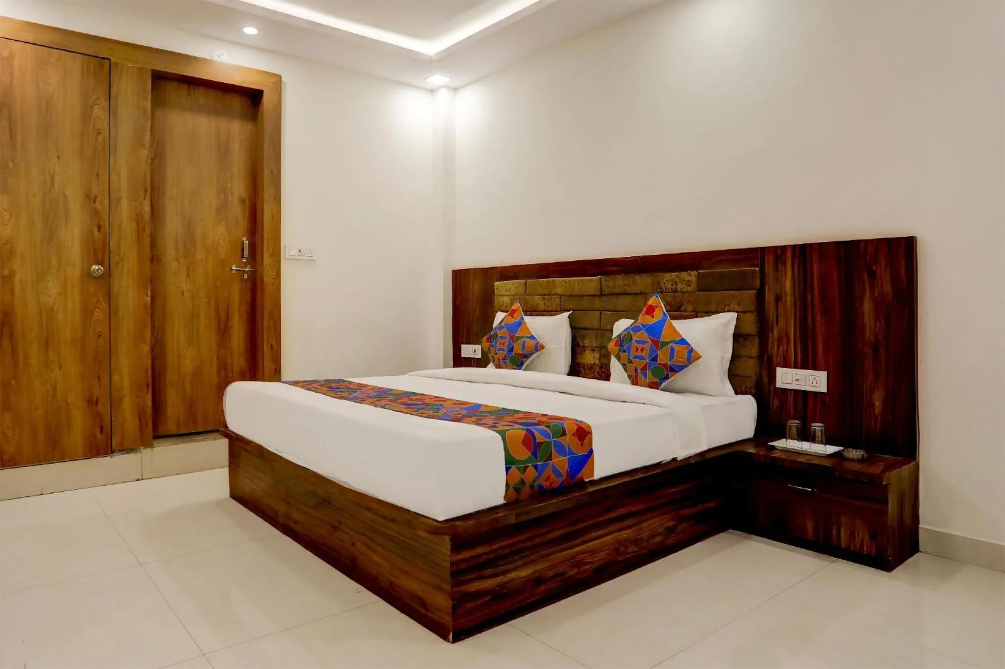 Bed in FabHotel Oriental