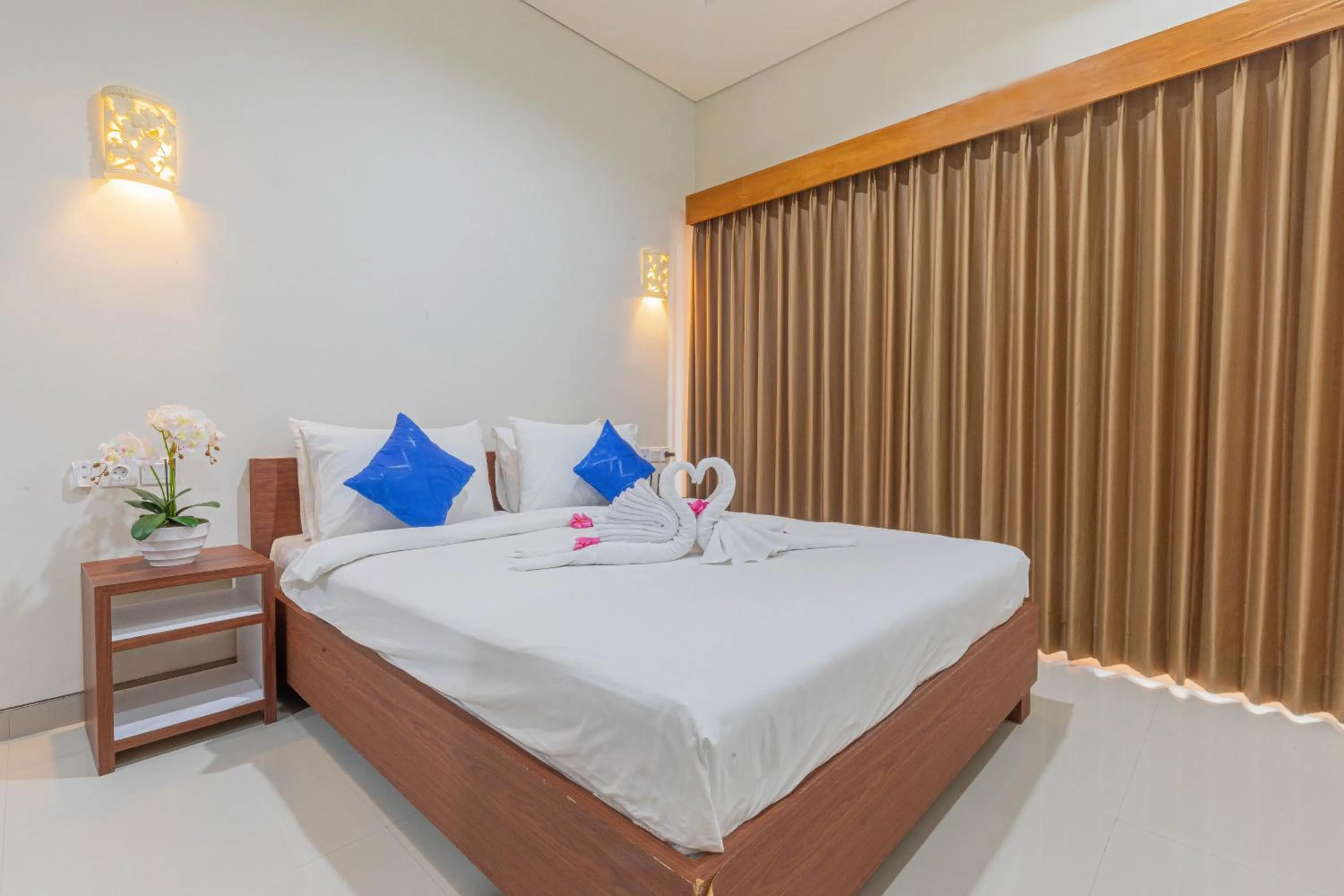 Bed in Candra Loka Studio & Apartment by The Loka