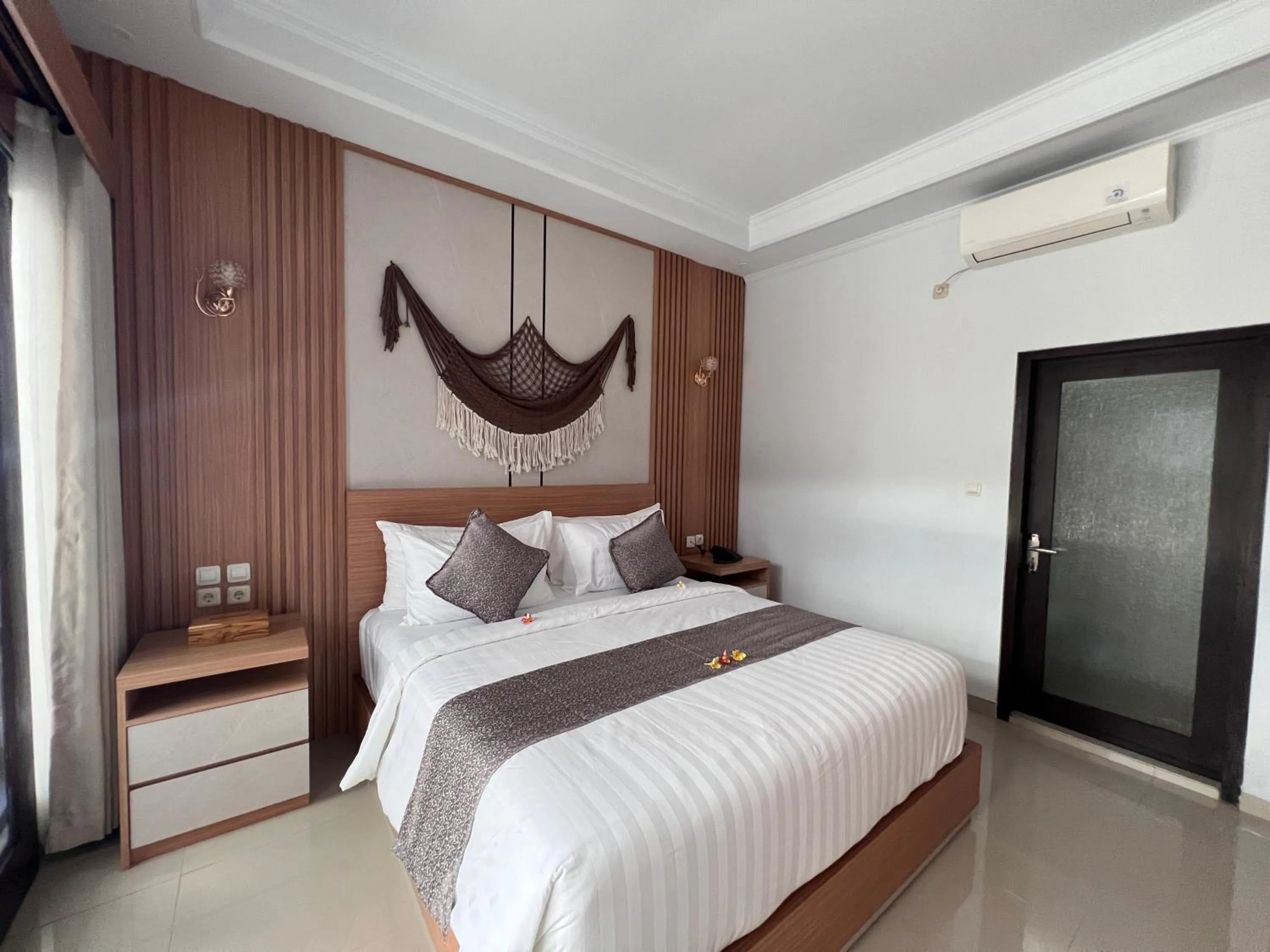 Bedroom, Bed in Grand Yuna Hotel Nusa Penida