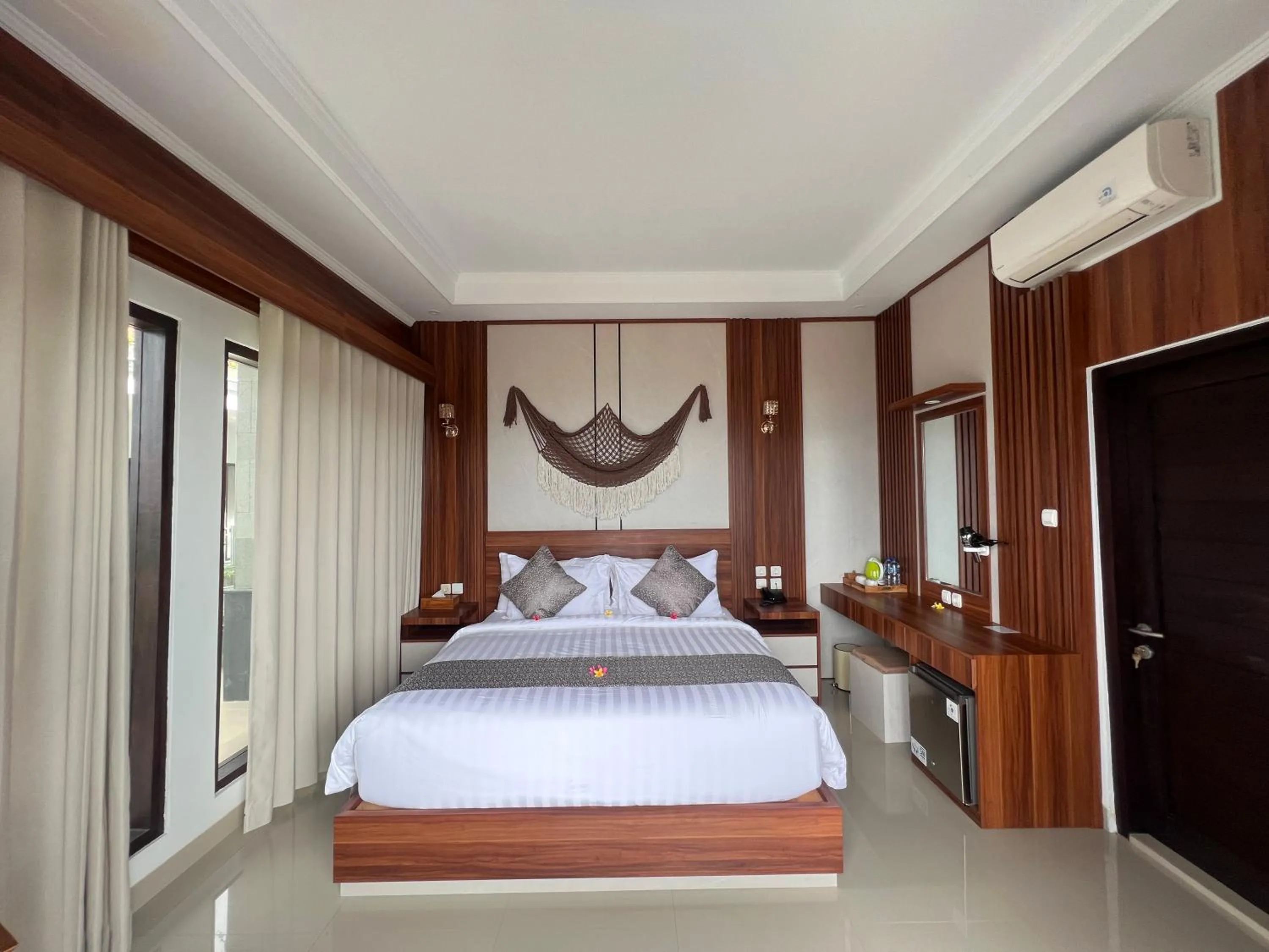 Bed in Grand Yuna Hotel Nusa Penida