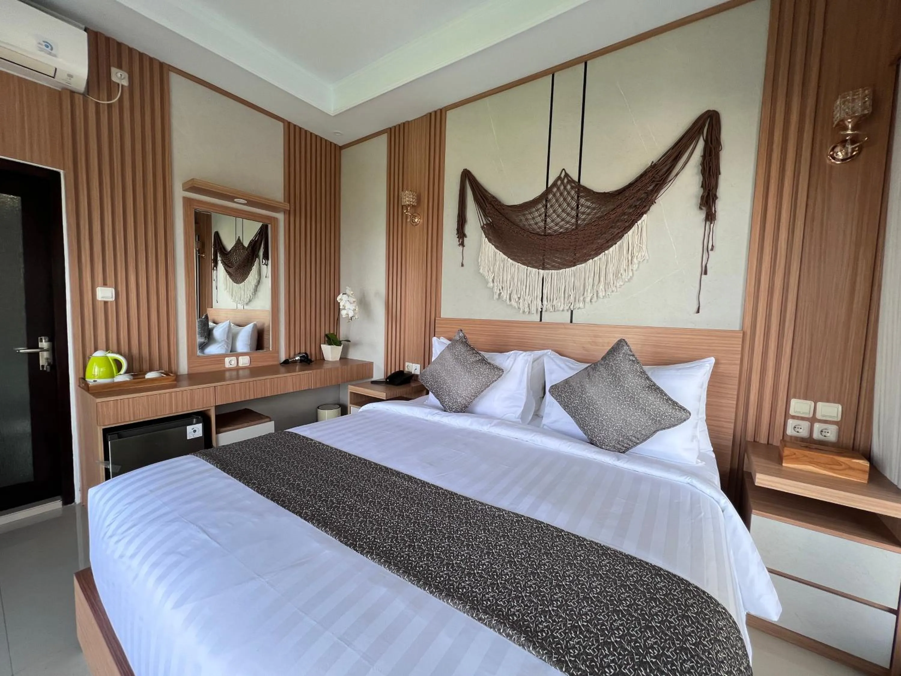Bed in Grand Yuna Hotel Nusa Penida