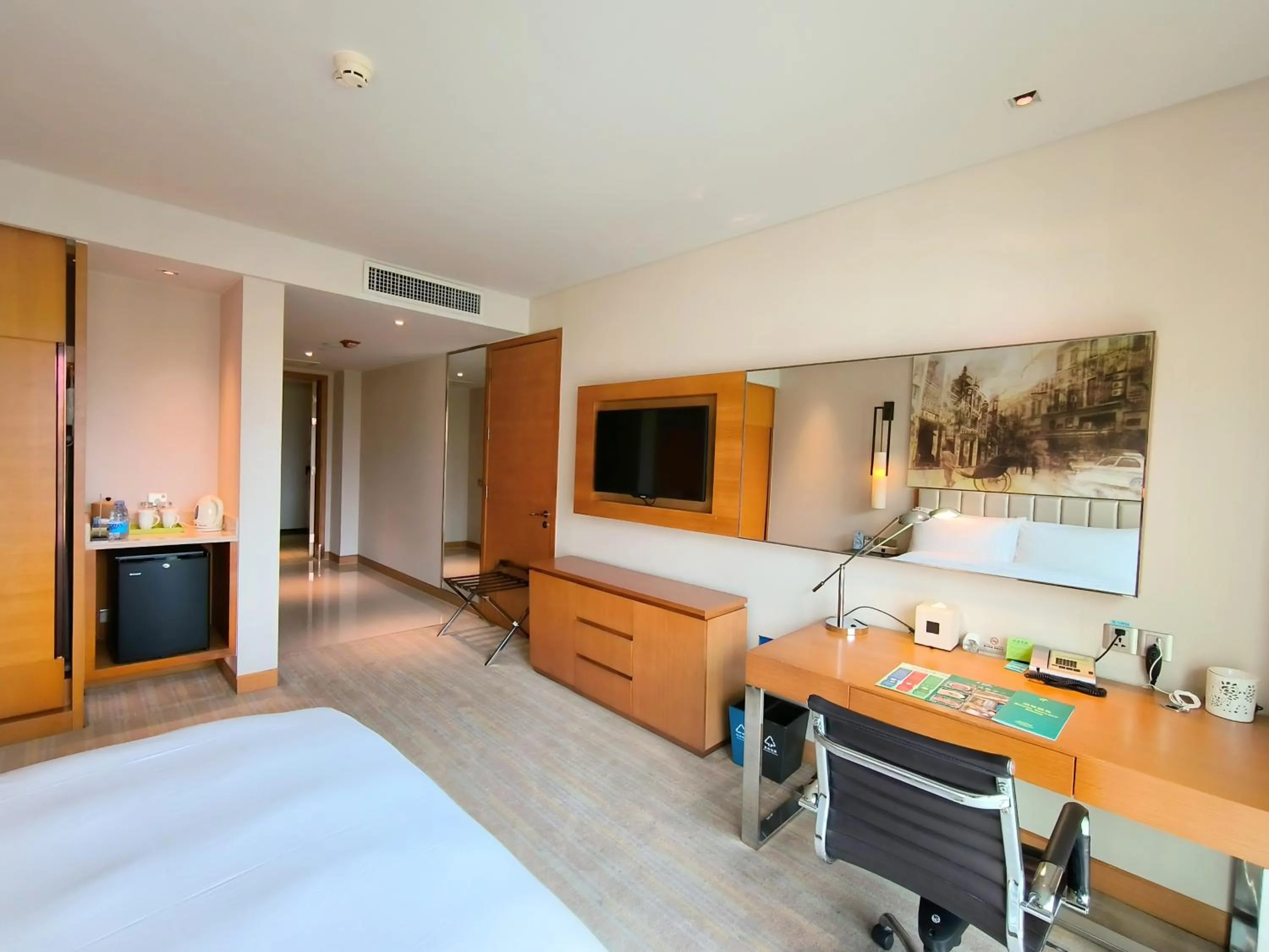 Photo of the whole room in Junluxe Hotel Guangzhou Science City-Free Shuttle Bus Service to Guangzhou Canton Fair