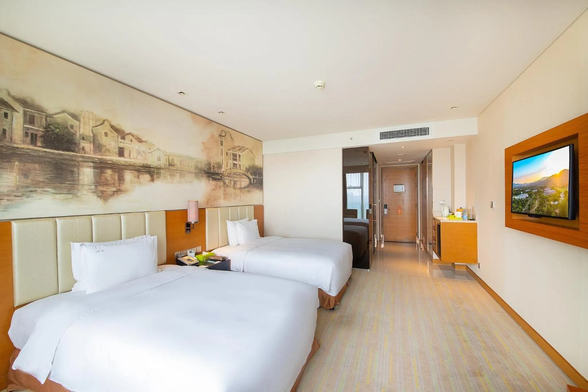 Photo of the whole room in Junluxe Hotel Guangzhou Science City-Free Shuttle Bus Service to Guangzhou Canton Fair