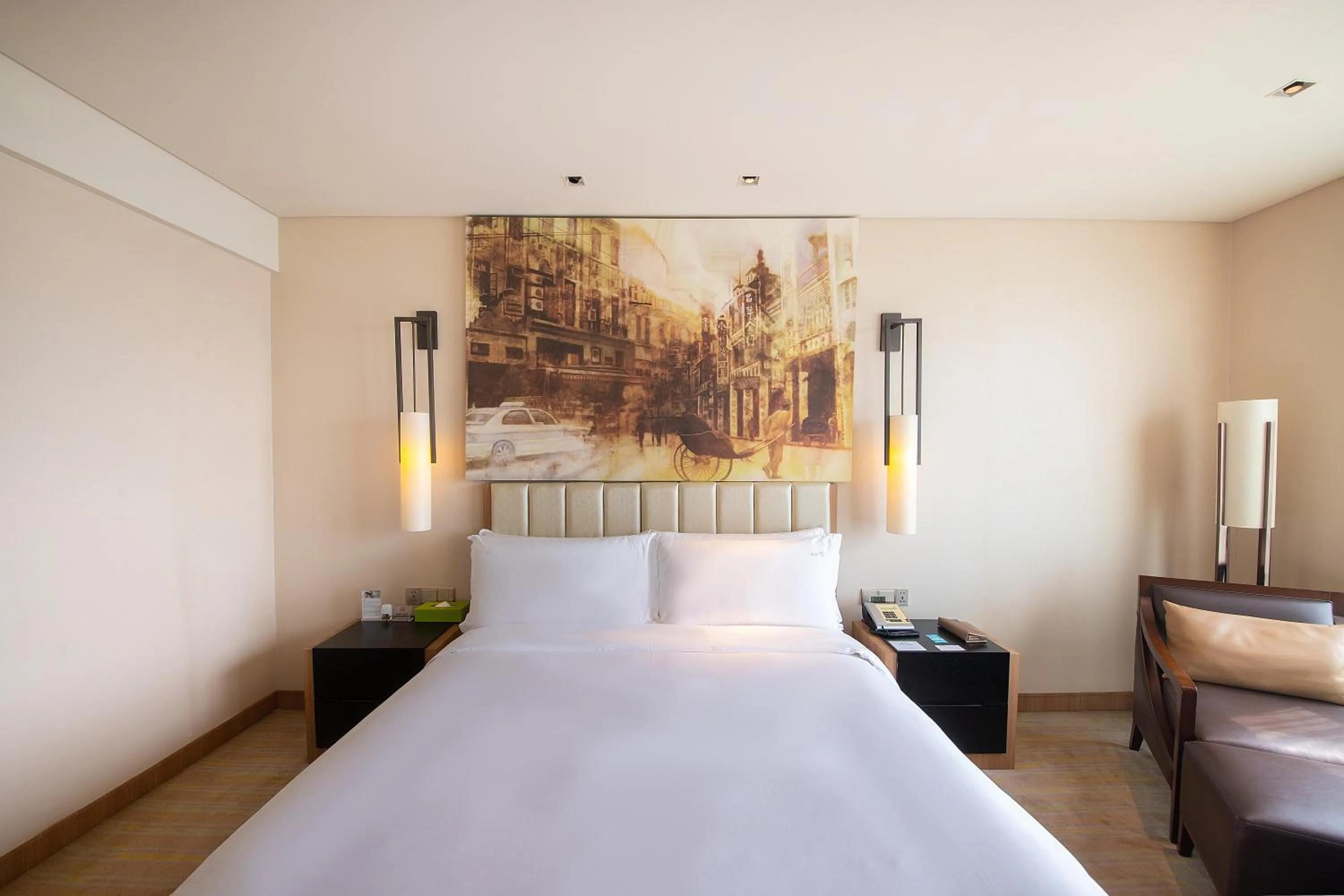 Bed in Junluxe Hotel Guangzhou Science City-Free Shuttle Bus Service to Guangzhou Canton Fair
