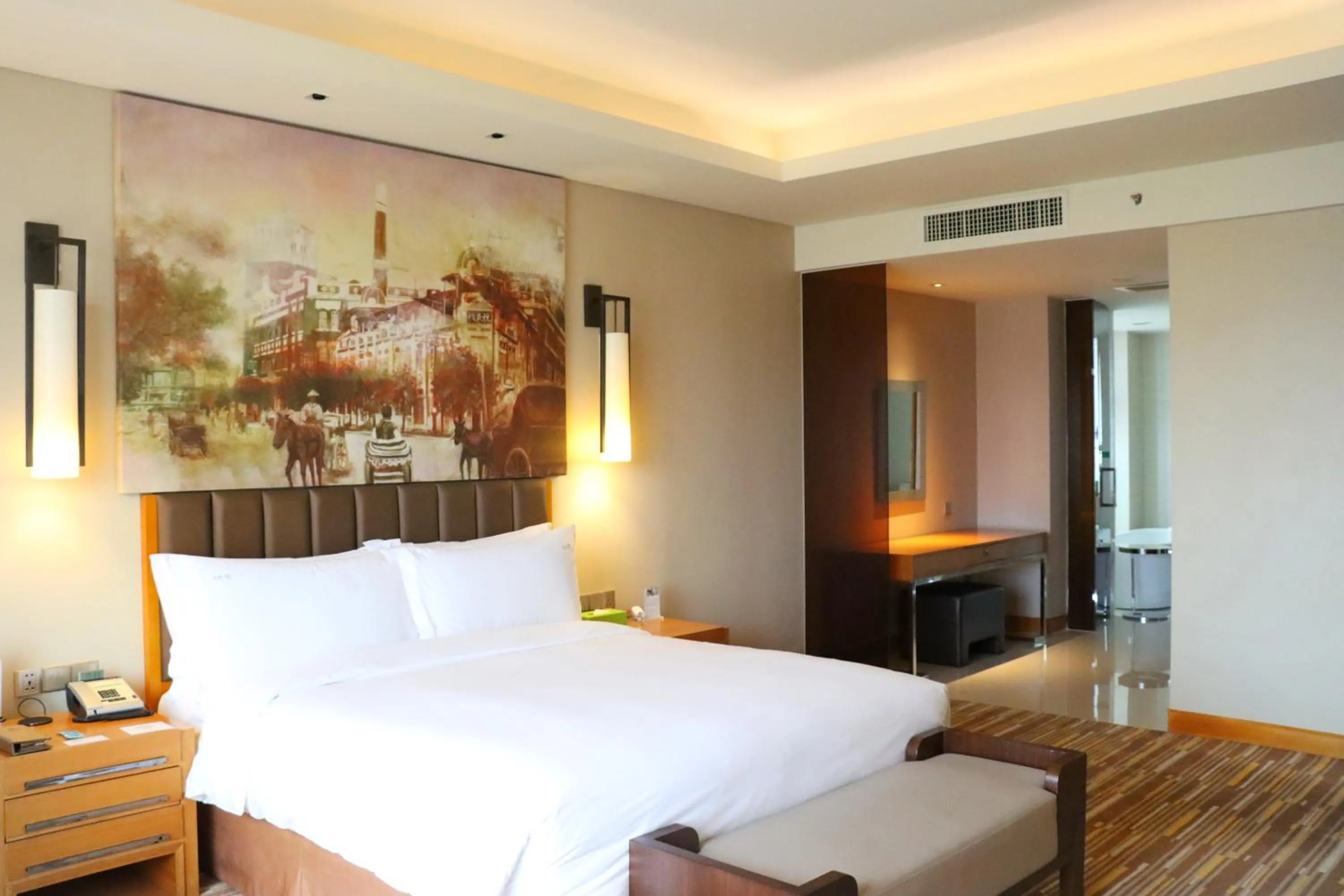 Bed in Junluxe Hotel Guangzhou Science City-Free Shuttle Bus Service to Guangzhou Canton Fair