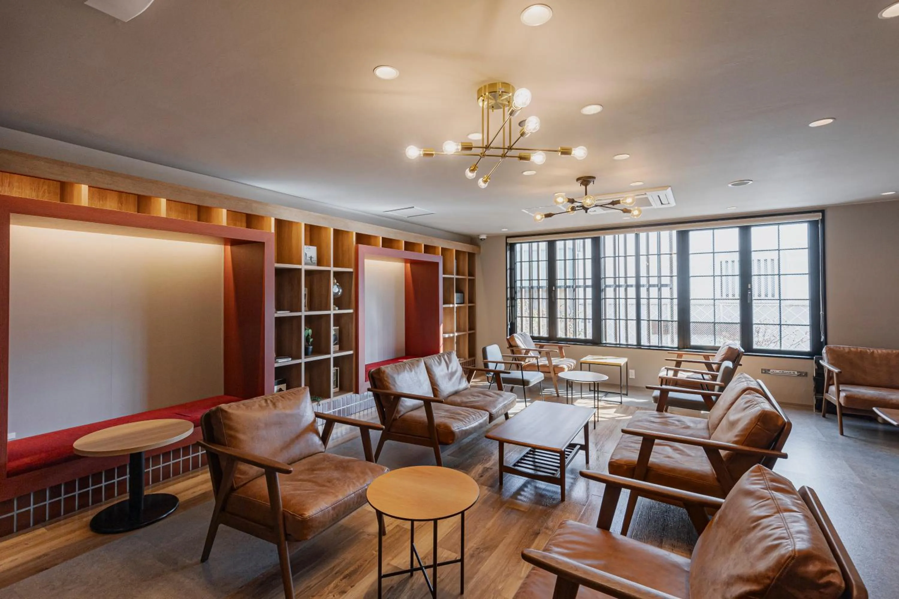 Communal lounge/ TV room in GEMS YUFUIN Hotel and Spa Cafe Bar