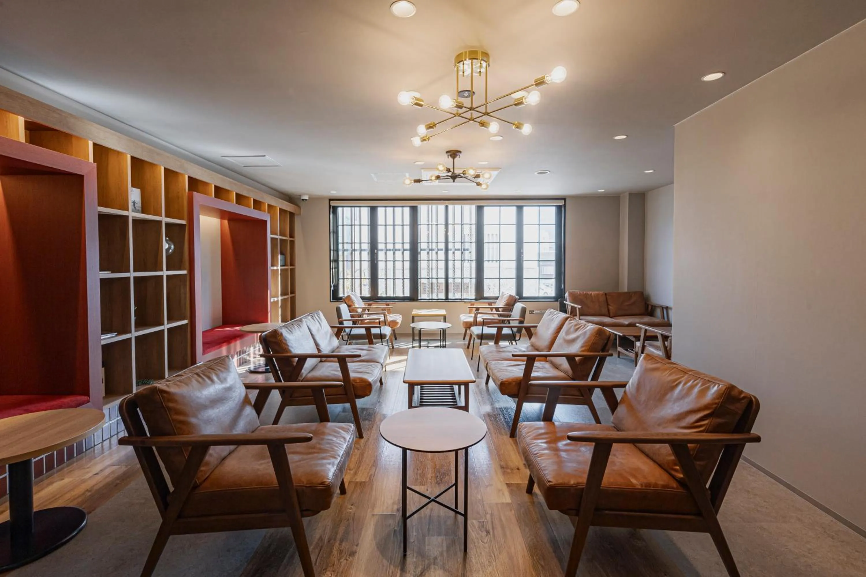 Communal lounge/ TV room in GEMS YUFUIN Hotel and Spa Cafe Bar