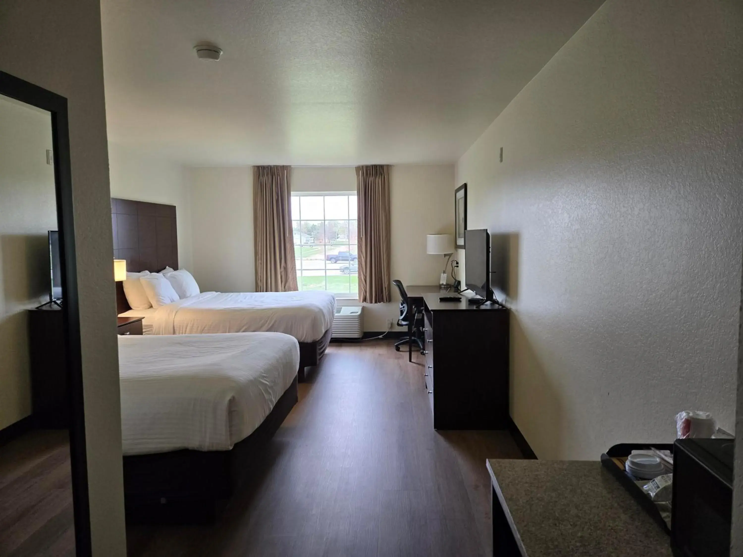 Bed in Cobblestone Inn & Suites - Schuyler Bed in Cobblestone Inn & Suites - Schuyler