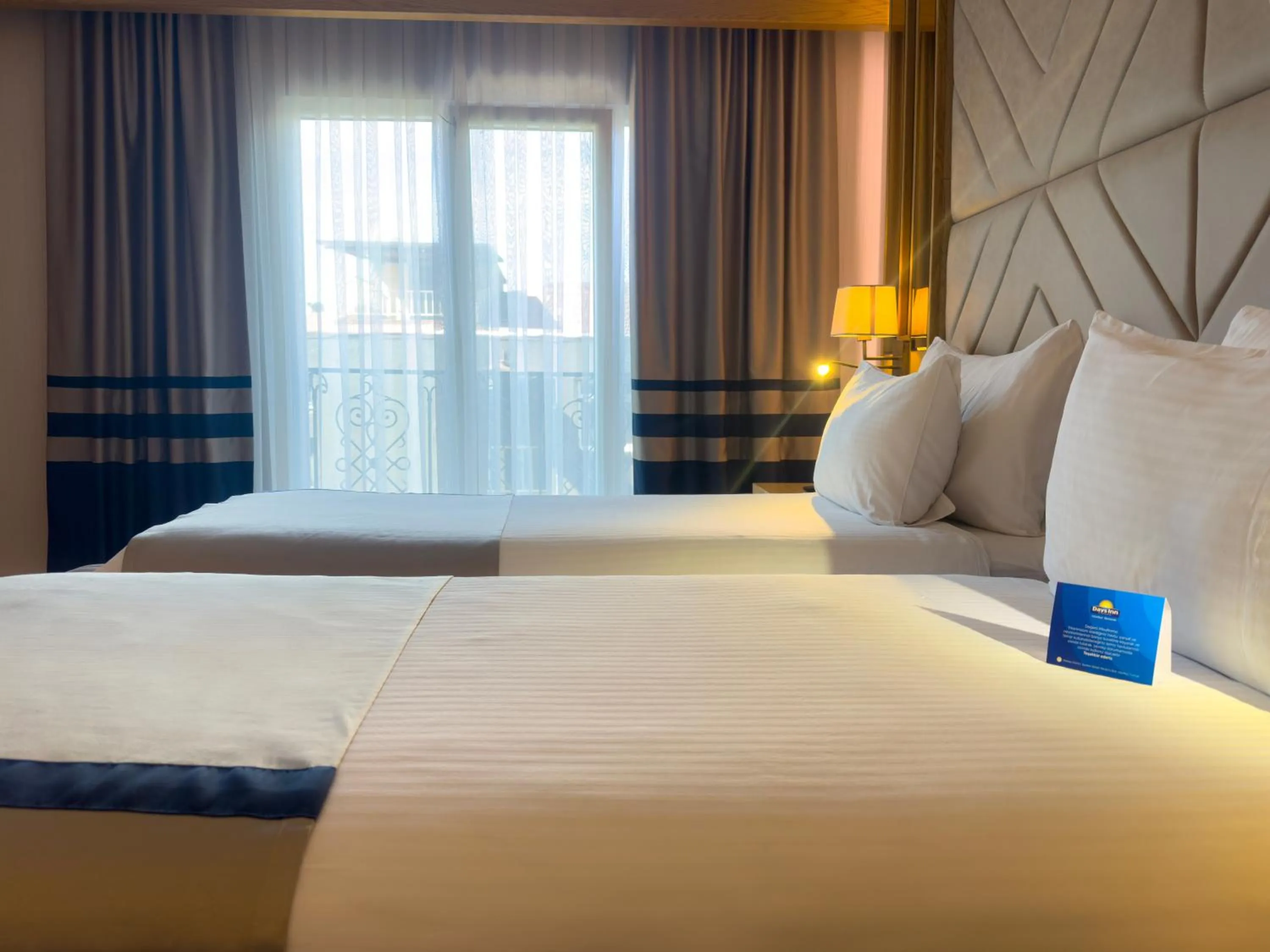 Bed in Days Inn by Wyndham Istanbul Bomonti