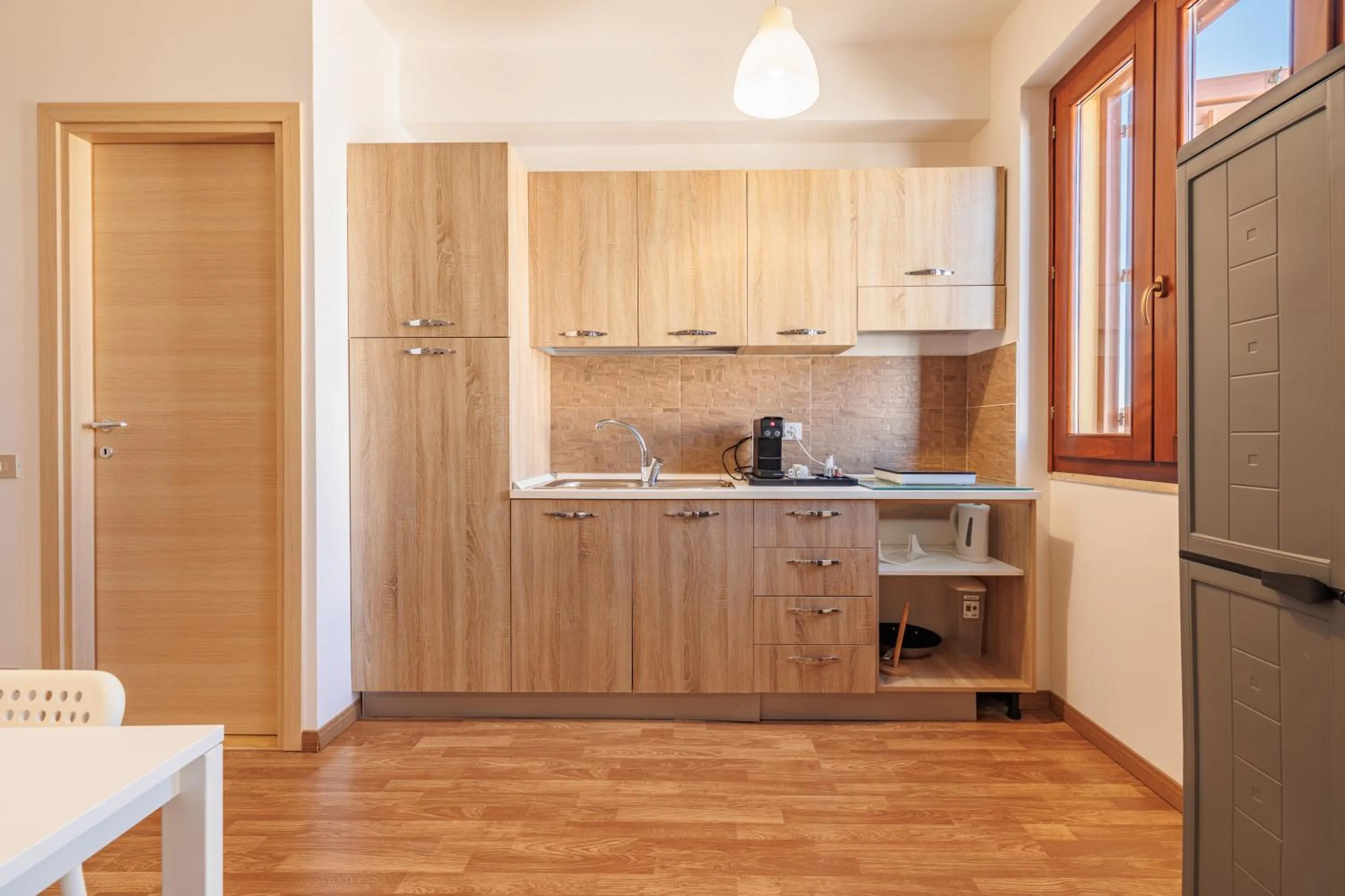 Kitchen or kitchenette in Marina di Petrolo Apartments
