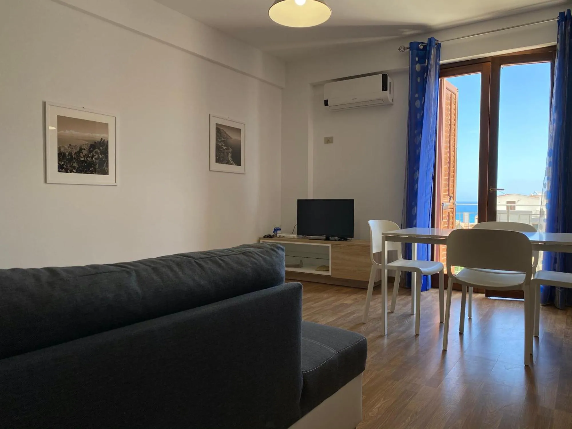 Photo of the whole room in Marina di Petrolo Apartments