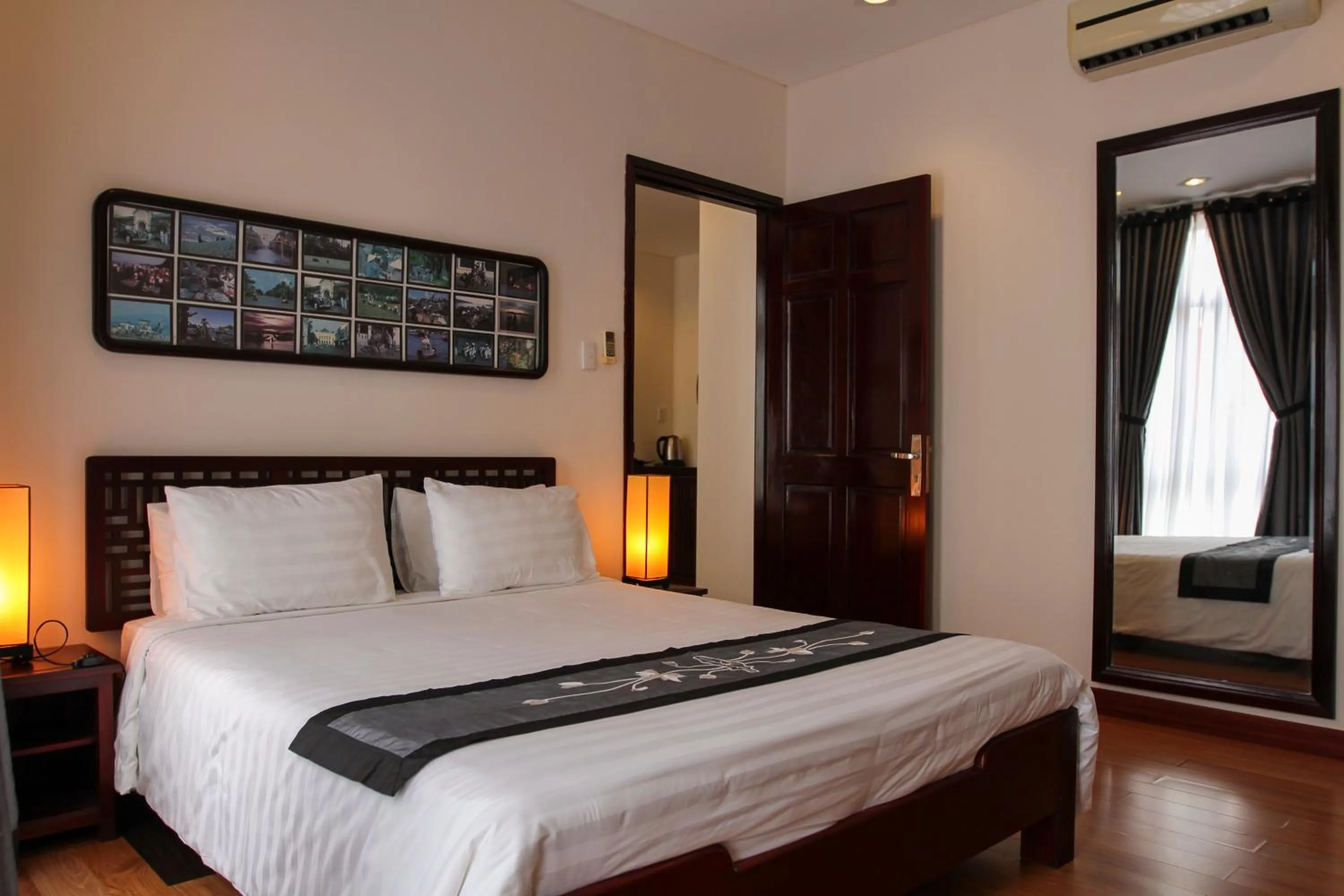 Bed in Nam Bo Boutique Hotel