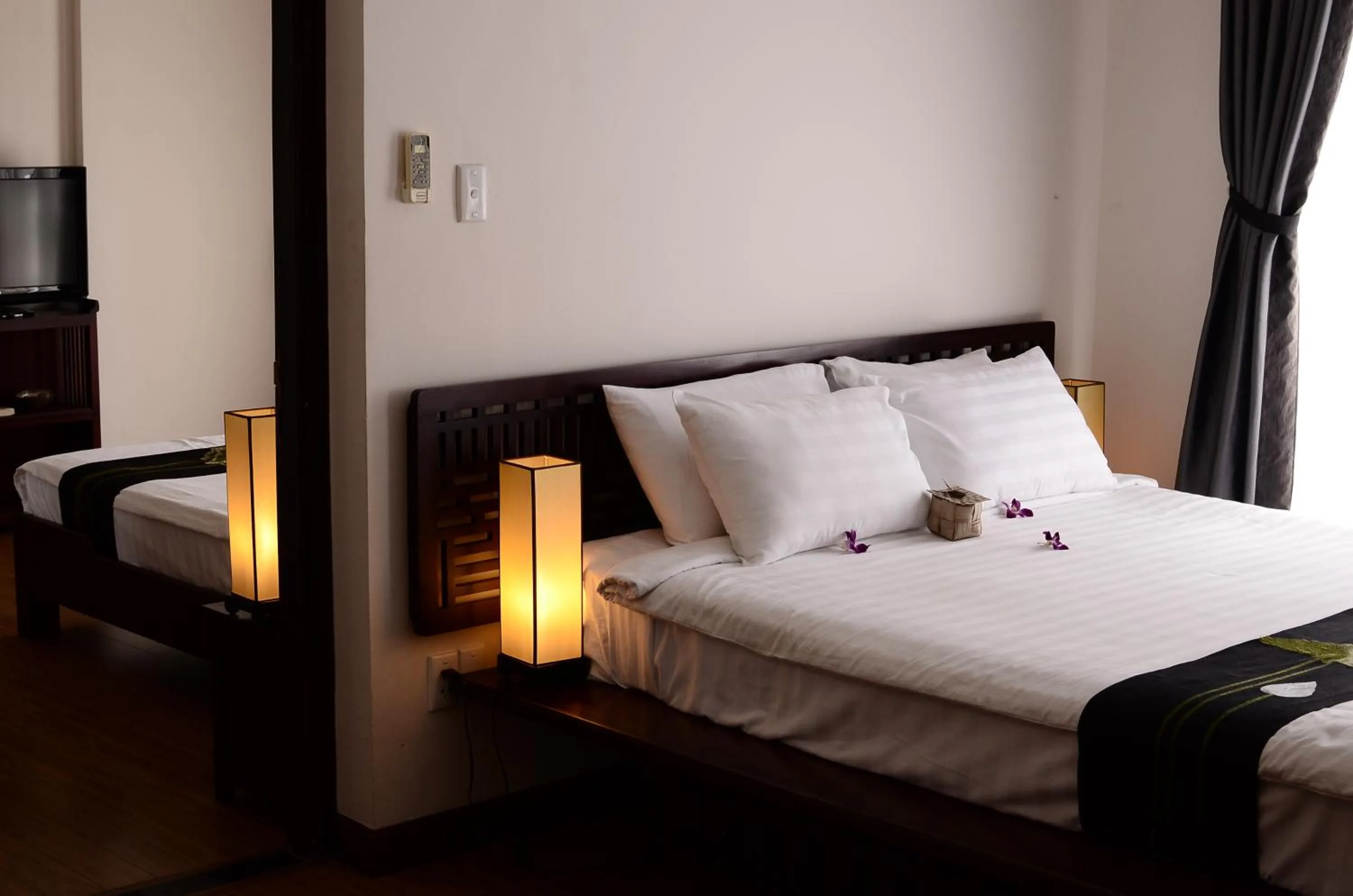Bed in Nam Bo Boutique Hotel