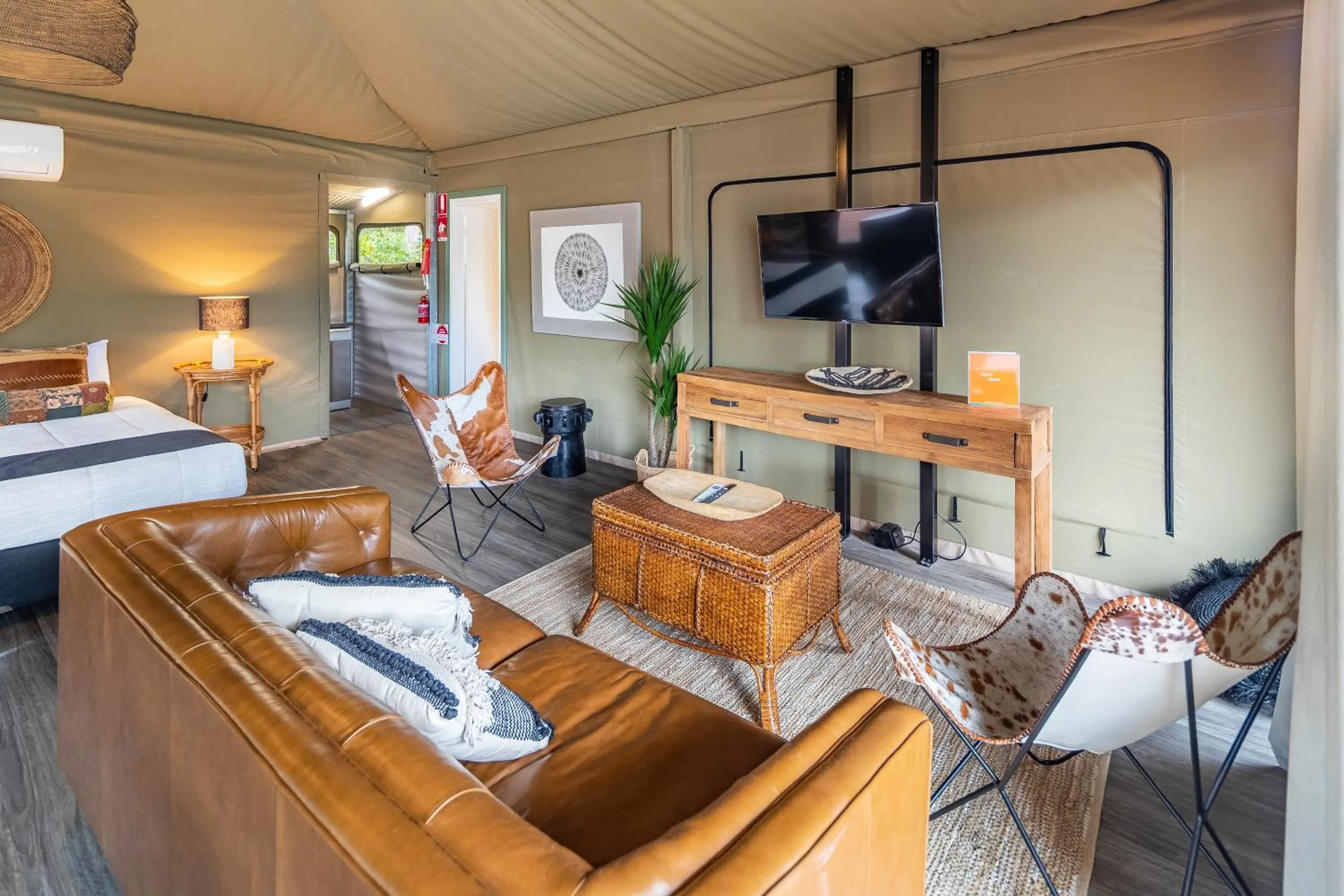 Living room, Bed in NRMA Broulee Holiday park