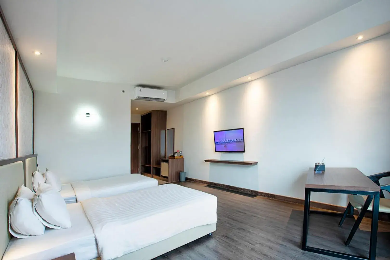 Bedroom, Bed in Wiltop Hotel Jambi Bedroom, Bed in Wiltop Hotel Jambi