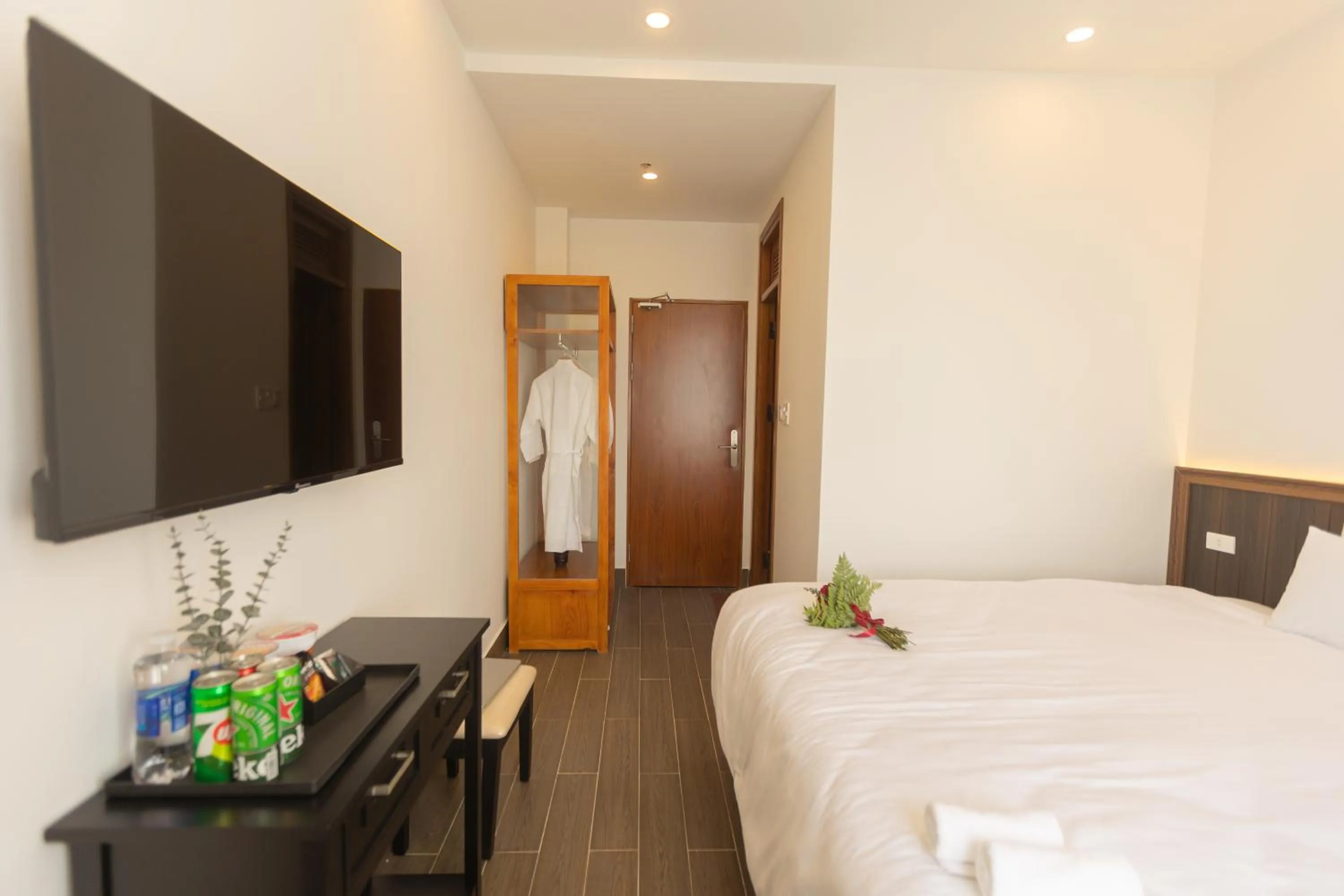 Communal lounge/ TV room, Bed in OLAGI HOTEL