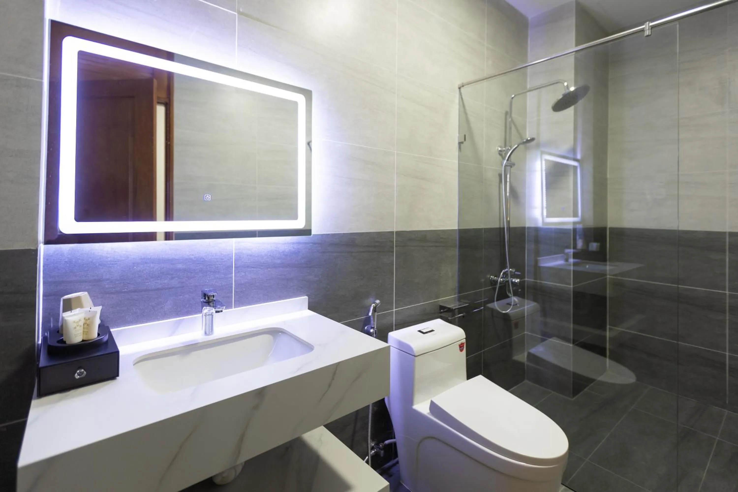 Shower in OLAGI HOTEL