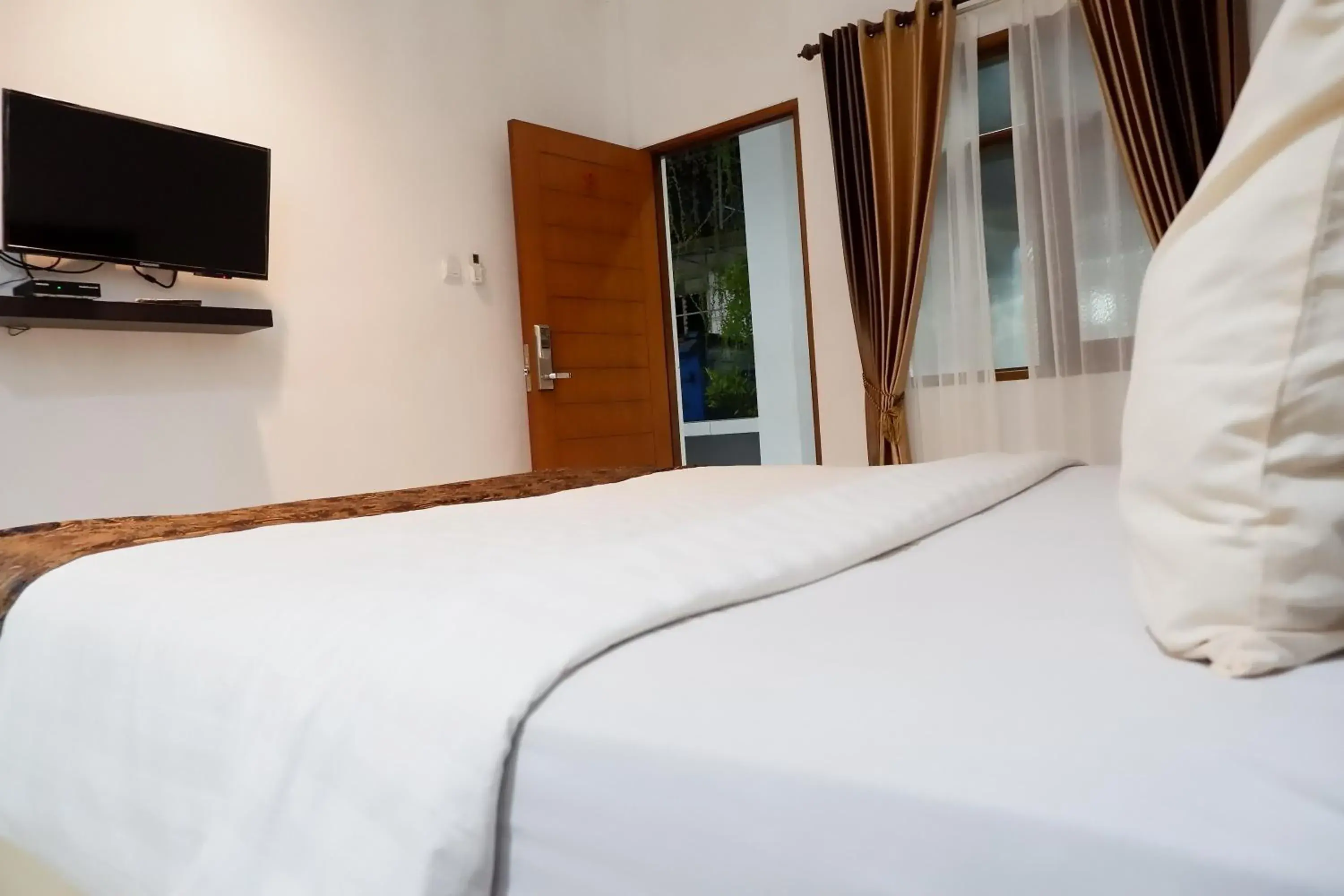 Bedroom, Bed in Hotel Netral Jombang Bedroom, Bed in Hotel Netral Jombang