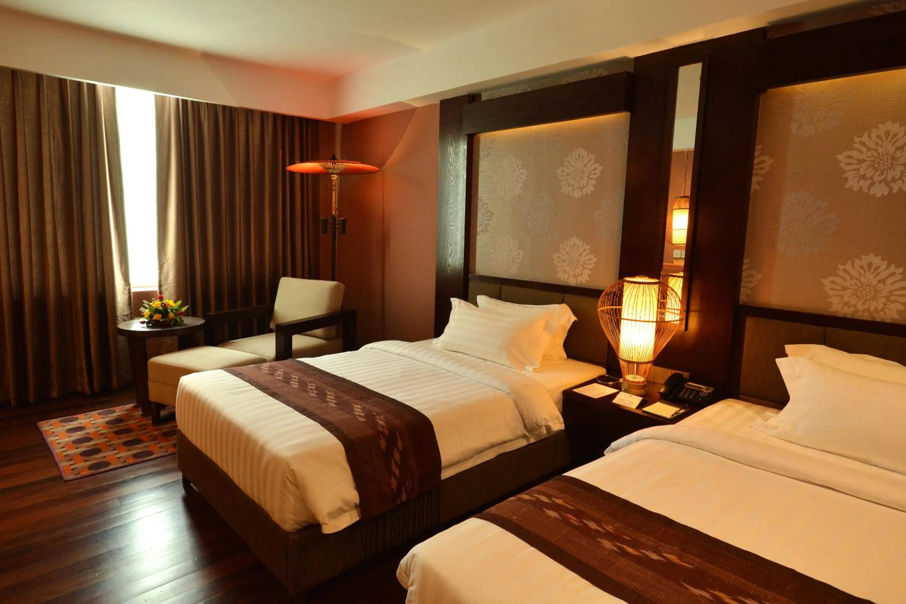 Bed in Rose Garden Hotel